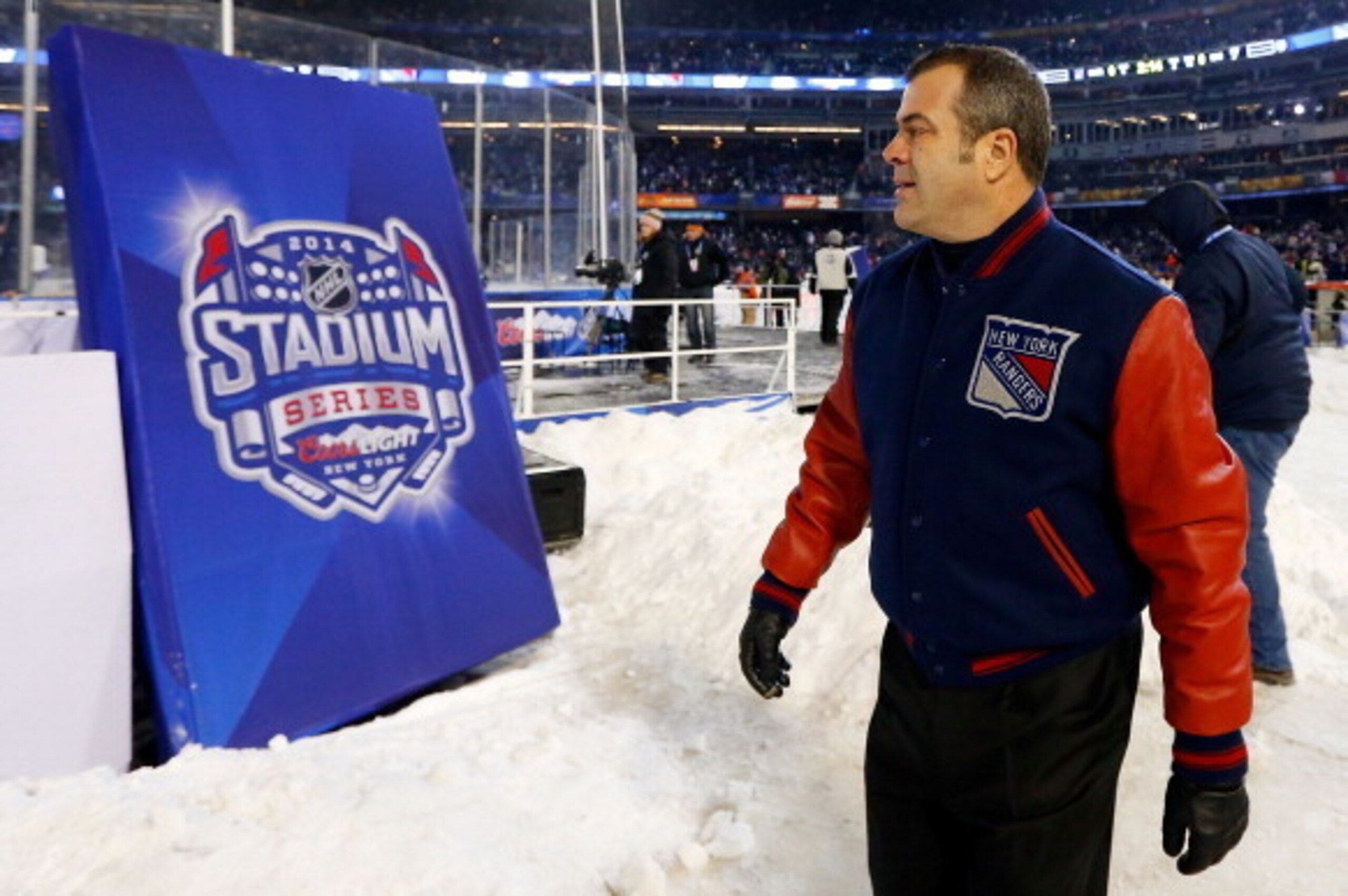 NEW YORK, NY - JANUARY 29:  (EDITORIAL USE ONLY)  New York Rangers head coach Alain Vigneault looks on during the game against the New York Islanders during the 2014 Coors Light NHL Stadium Series at Yankee Stadium on January 29, 2014 in the Bronx borough