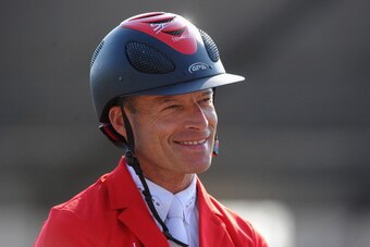 LONDON, ENGLAND - JUNE 06:  Pius Schwizer of Switzerland finished first in the afternoon race during the Longines Global Champions Tour of London - Day One show jumping at Olympic Park on June 6, 2013 in London, England.  (Photo by Mike Hewitt/Getty Image