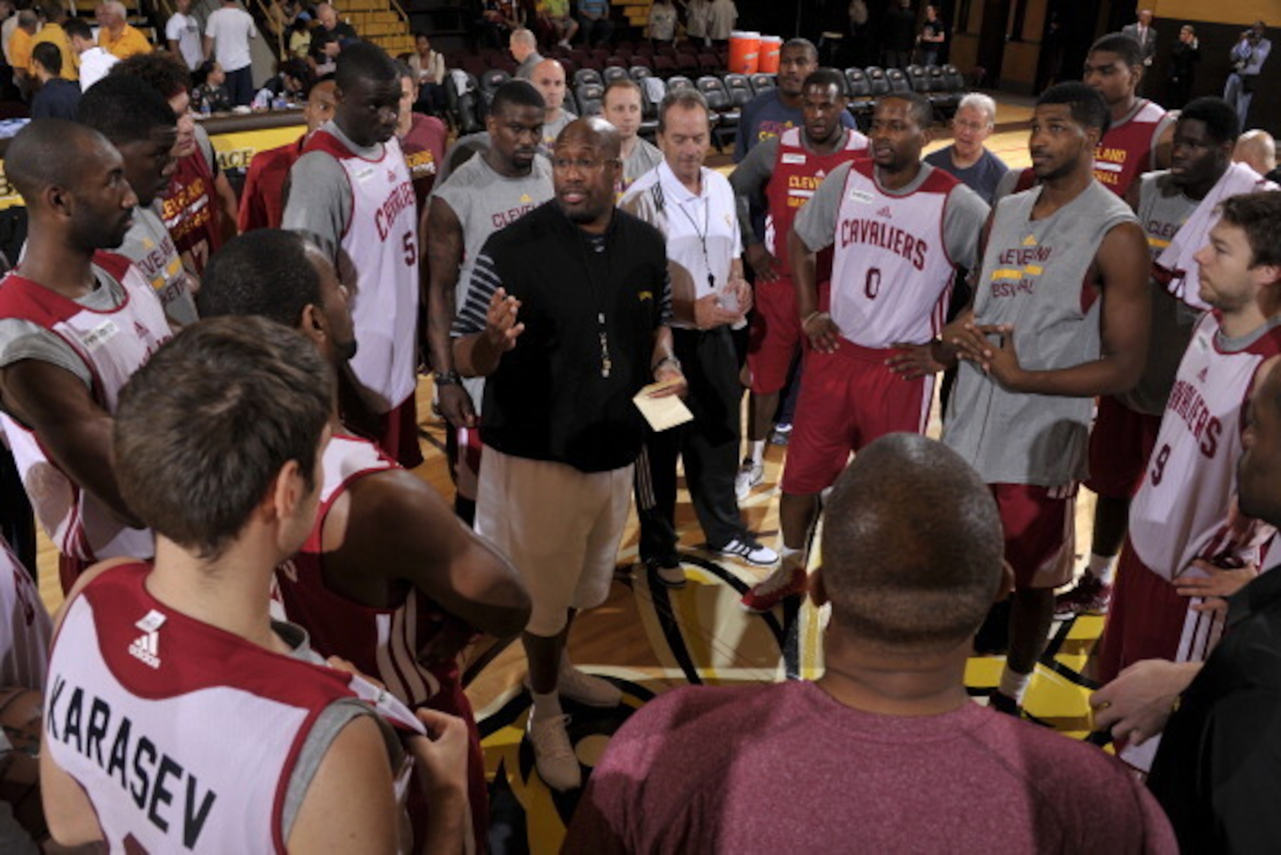 BEREA, OH - OCTOBER 5:  Head coach Mike Brown addresses the team prior to their annual Wine & Gold Scrimmage at The Rudolph Ursprung Gymnasium on October 5, 2013 in Berea, Ohio. NOTE TO USER: User expressly acknowledges and agrees that, by downloading and