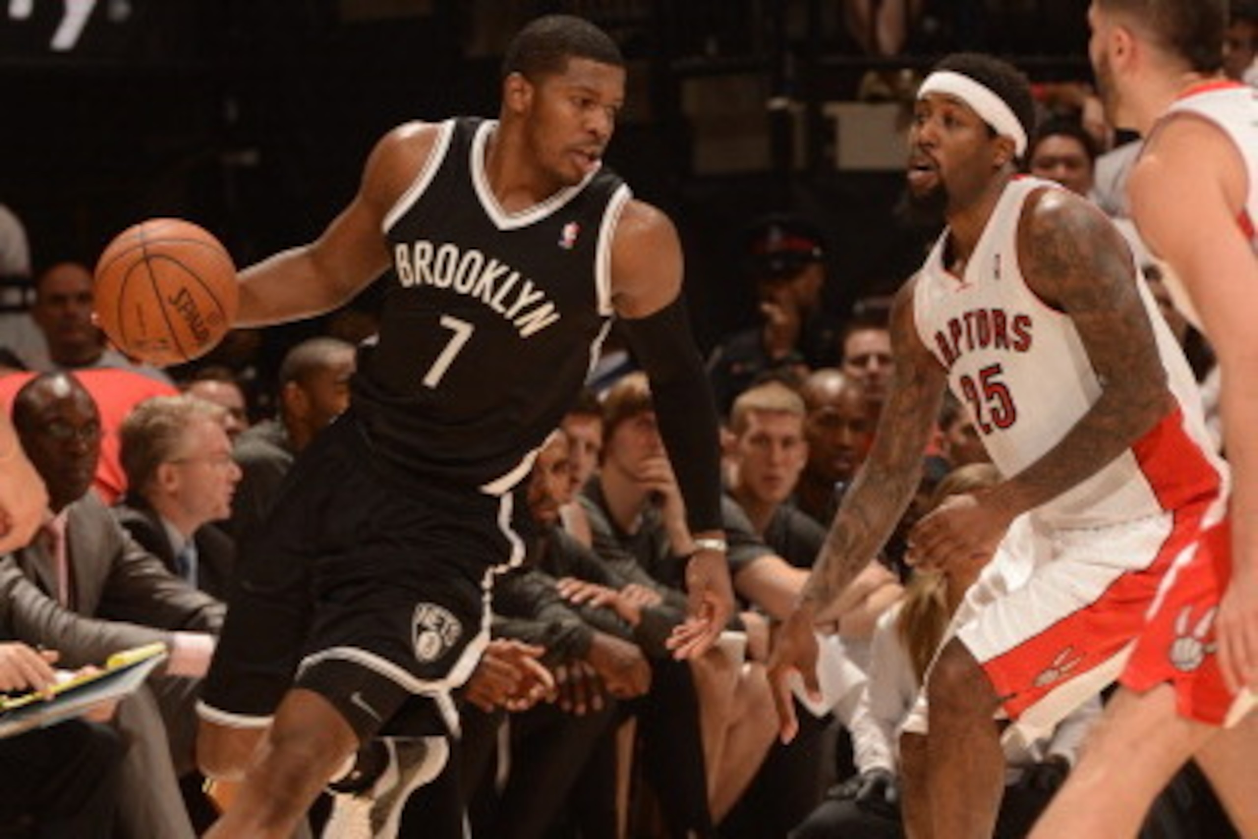TORONTO, CANADA - April 19: Joe Johnson #7 of the Brooklyn Nets drives against the Toronto Raptors during Game One of the Eastern Conference Quarterfinals of the 2014 NBA playoffs on April 19, 2014 at the Air Canada Centre in Toronto, Ontario, Canada.  NO