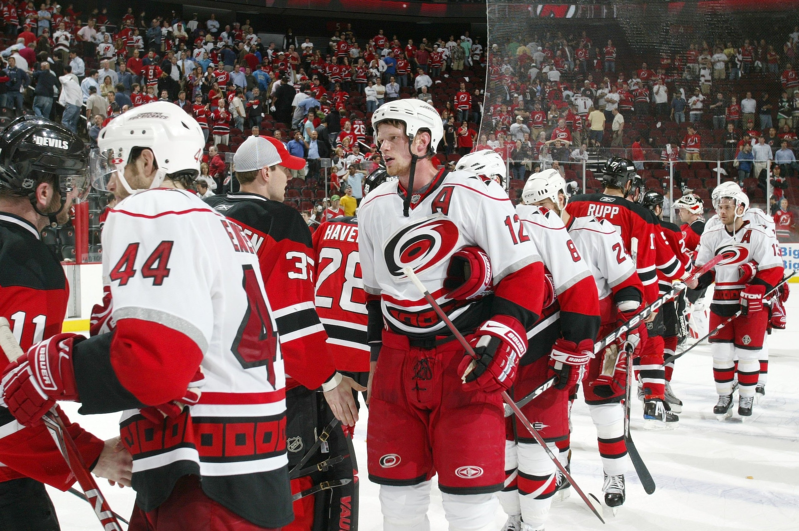 NEWARK, NJ - APRIL 28: The Carolina Hurricanes are congratulated by the New Jersey Devils during the traditional handshake after the Hurricanes defeated the Devils 4-3 in Game Seven of the Eastern Conference Quarterfinal Round of the 2009 Stanley Cup Play