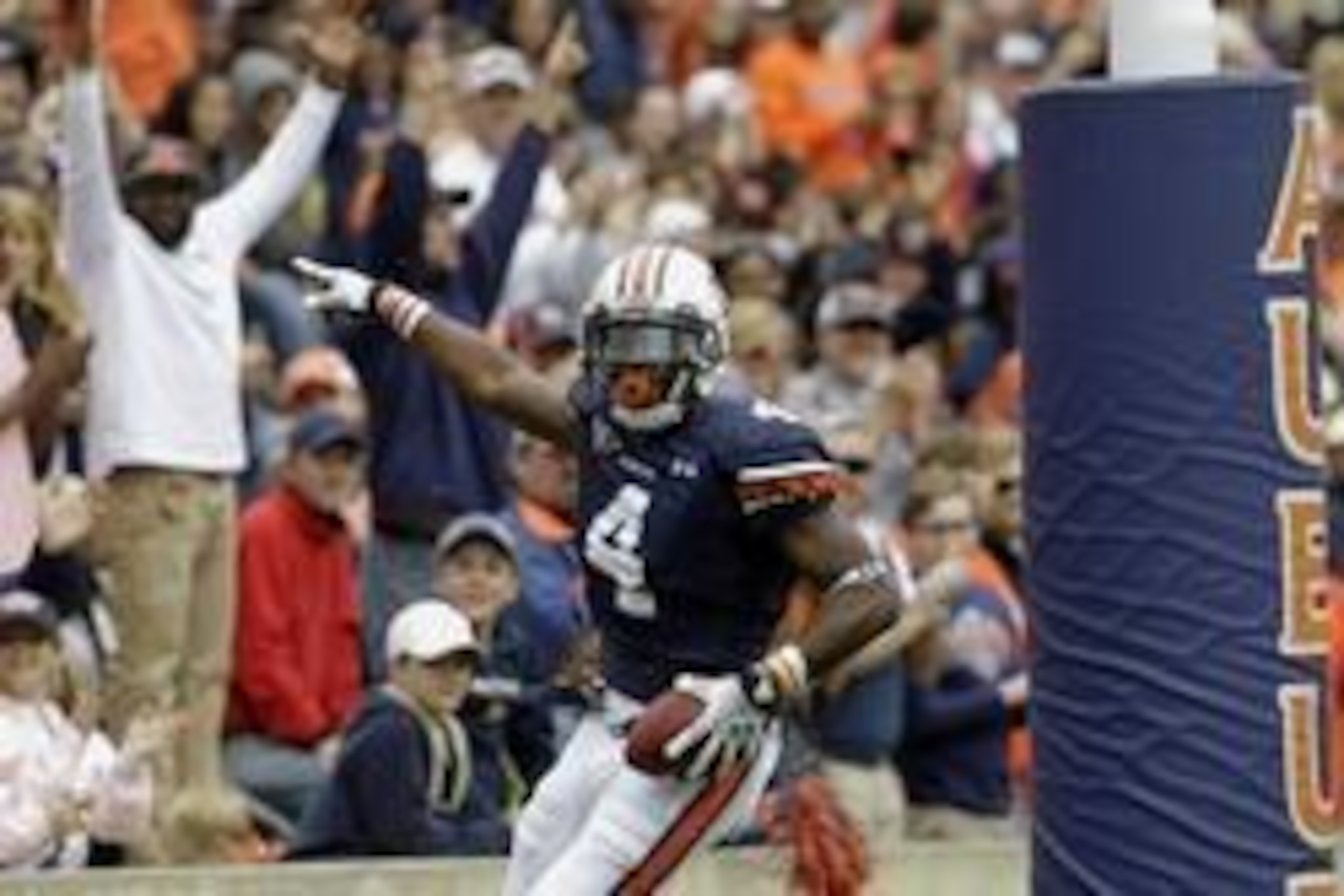 Apr 19, 2014; Auburn, AL, USA;  Auburn Tigers receiver Quan Bray (4) celebrates after scoring a touchdown during the first half of the A-Day spring game at Jordan Hare Stadium. Mandatory Credit: John Reed-USA TODAY Sports