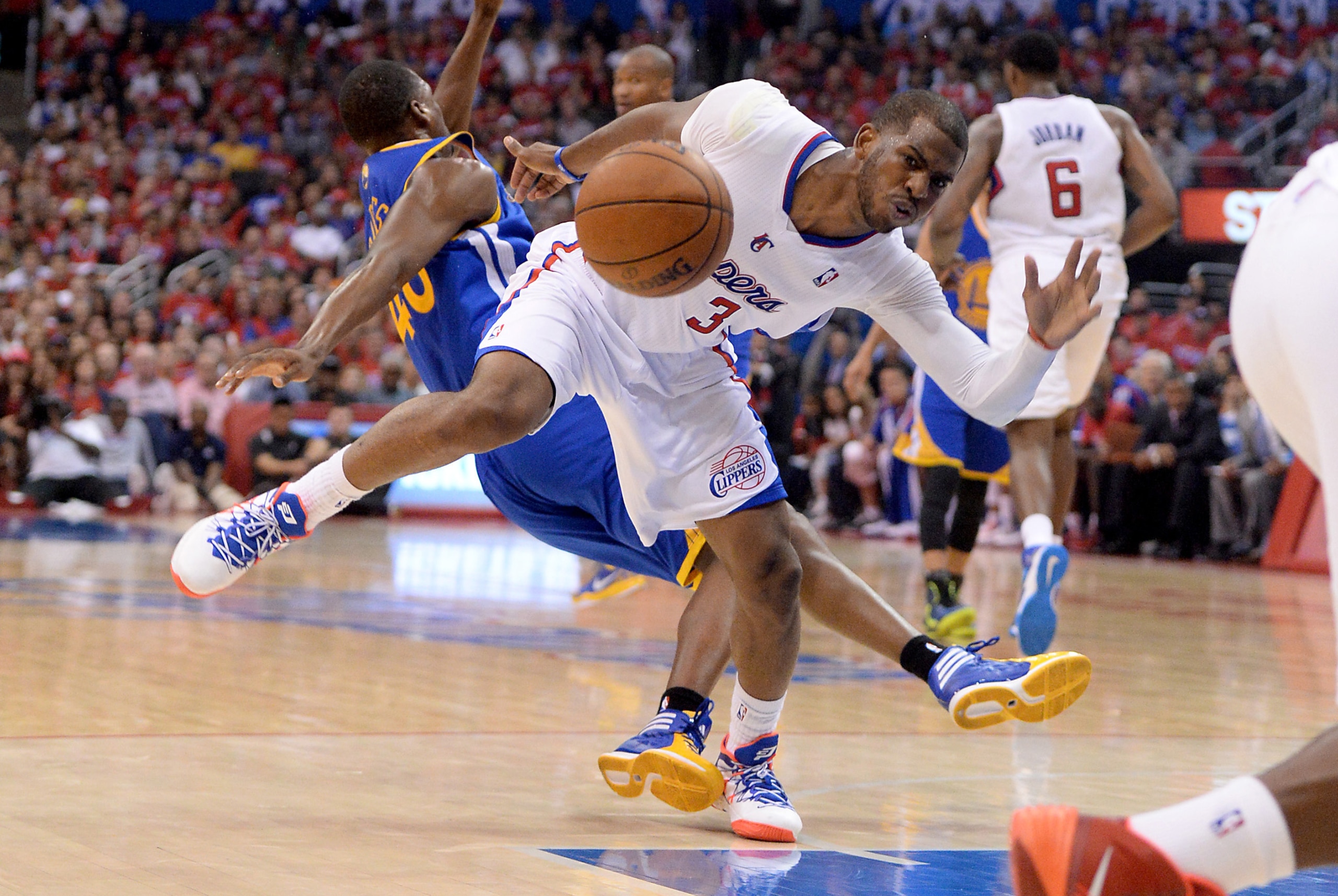 Apr 19, 2014; Los Angeles, CA, USA; Los Angeles Clippers guard Chris Paul (3) and Golden State Warriors forward Harrison Barnes (40) collide in the first half in game one during the first round of the 2014 NBA Playoffs at Staples Center. Mandatory Credit Apr 19, 2014; Los Angeles, CA, USA; Los Angeles Clippers guard Chris Paul (3) and Golden State Warriors forward Harrison Barnes (40) collide in the first half in game one during the first round of the 2014 NBA Playoffs at Staples Center. Mandatory Credit