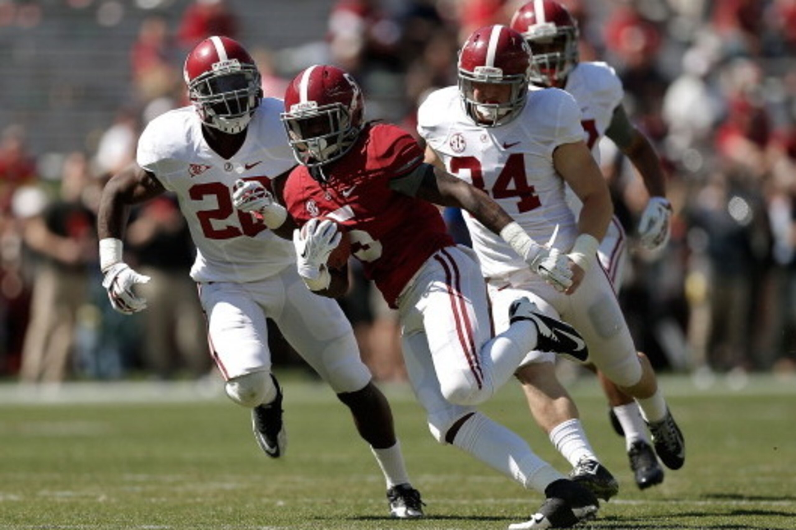 TUSCALOOSA, AL - APRIL 19:  Chris Black #5 of the Crimson team runs for yards against the White team during the University of Alabama A-Day spring game at Bryant-Denny Stadium on April 19, 2014 in Tuscaloosa, Alabama.  (Photo by Stacy Revere/Getty Images)