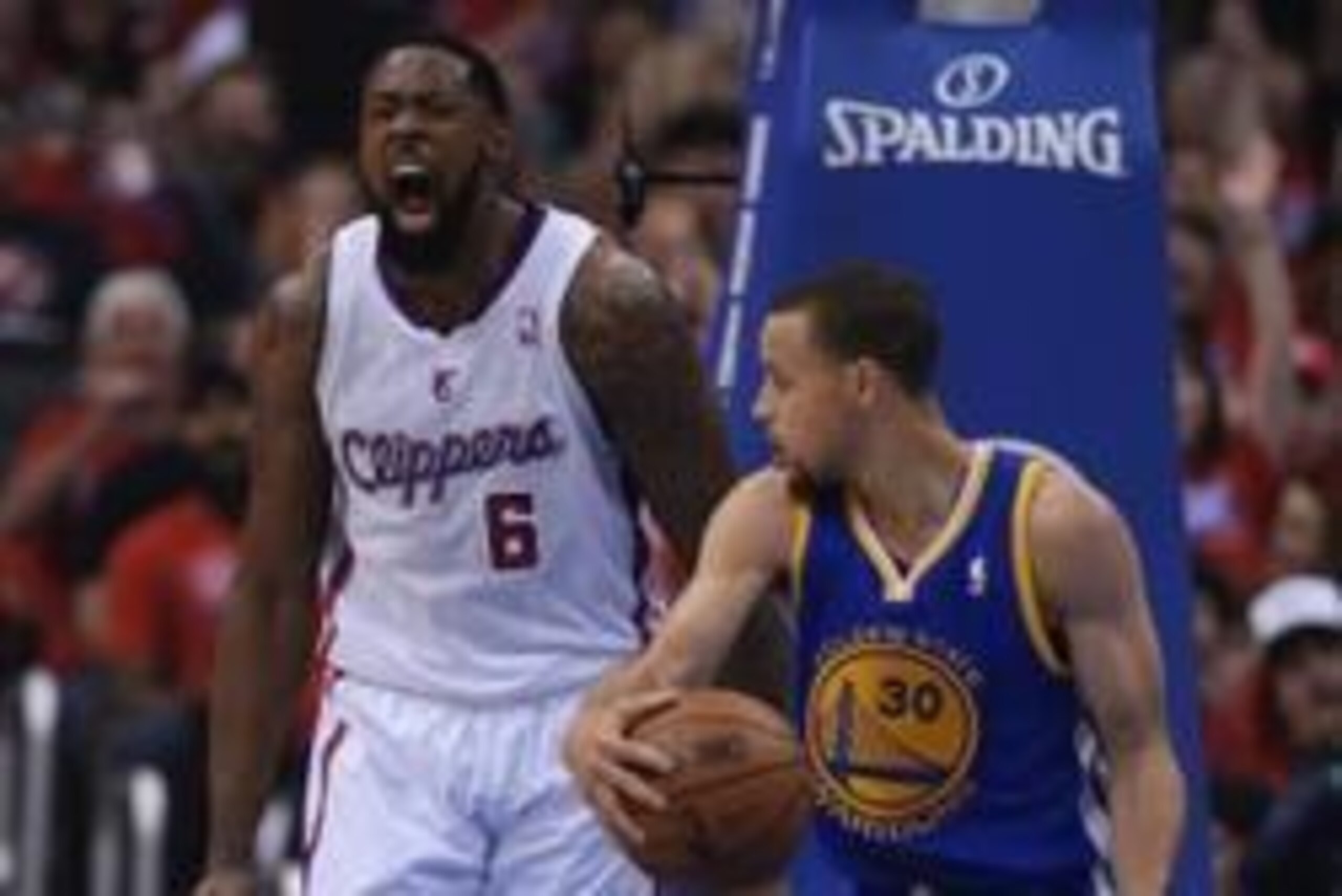 Apr 19, 2014; Los Angeles, CA, USA; Golden State Warriors guard Stephen Curry (30) looks on as Los Angeles Clippers center DeAndre Jordan (6) reacts to a dunk in the first quarter in game one during the first round of the 2014 NBA Playoffs at Staples Cent Apr 19, 2014; Los Angeles, CA, USA; Golden State Warriors guard Stephen Curry (30) looks on as Los Angeles Clippers center DeAndre Jordan (6) reacts to a dunk in the first quarter in game one during the first round of the 2014 NBA Playoffs at Staples Cent