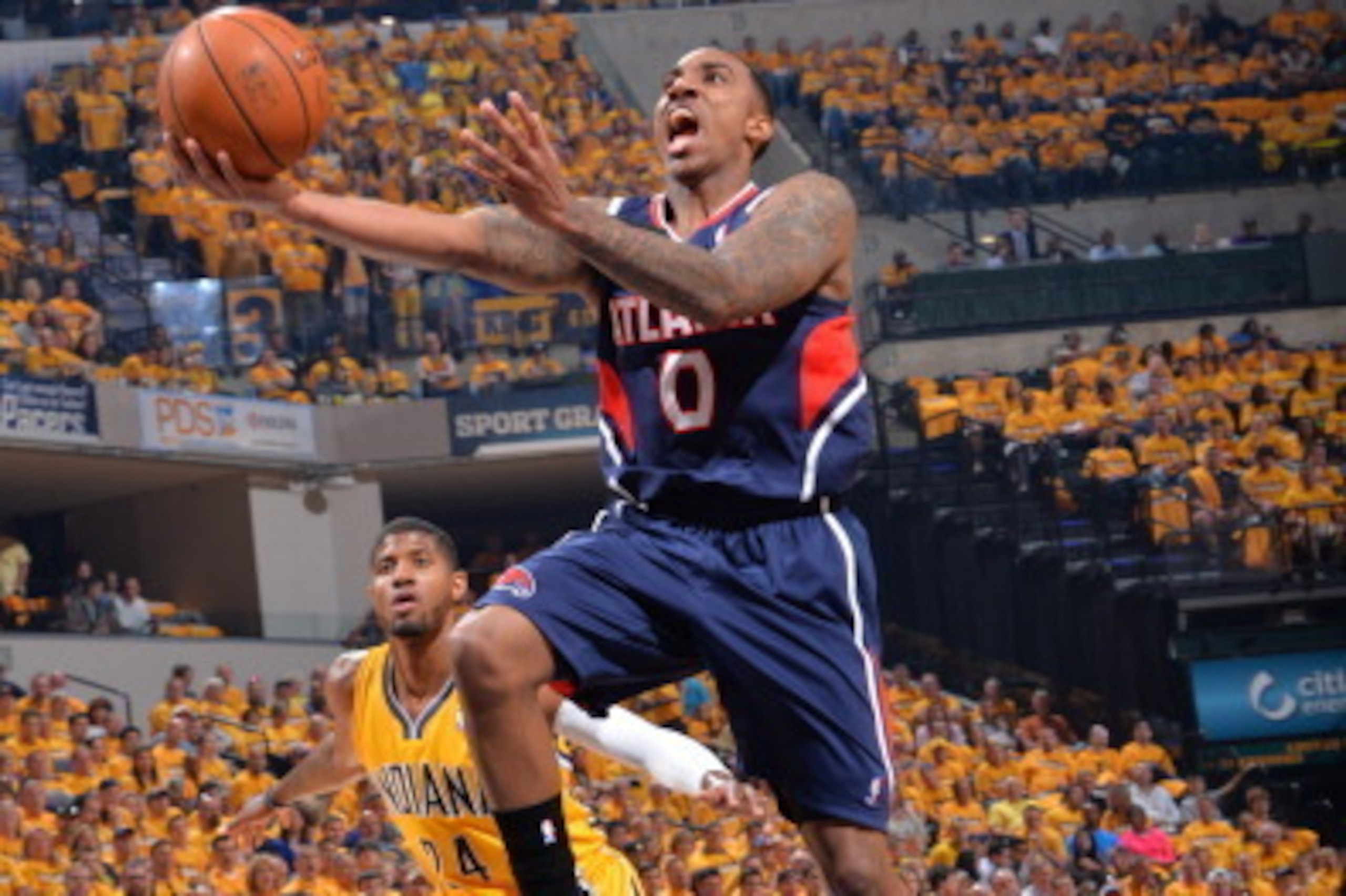 INDIANAPOLIS, IN - APRIL 19: Jeff Teague #0 of the Atlanta Hawks goes up for the layup against the Indiana Pacers in Game One of the Eastern Conference Quarterfinals during the 2014 NBA Playoffs on April 19, 2014 at Bankers Life Fieldhouse in Indianapolis