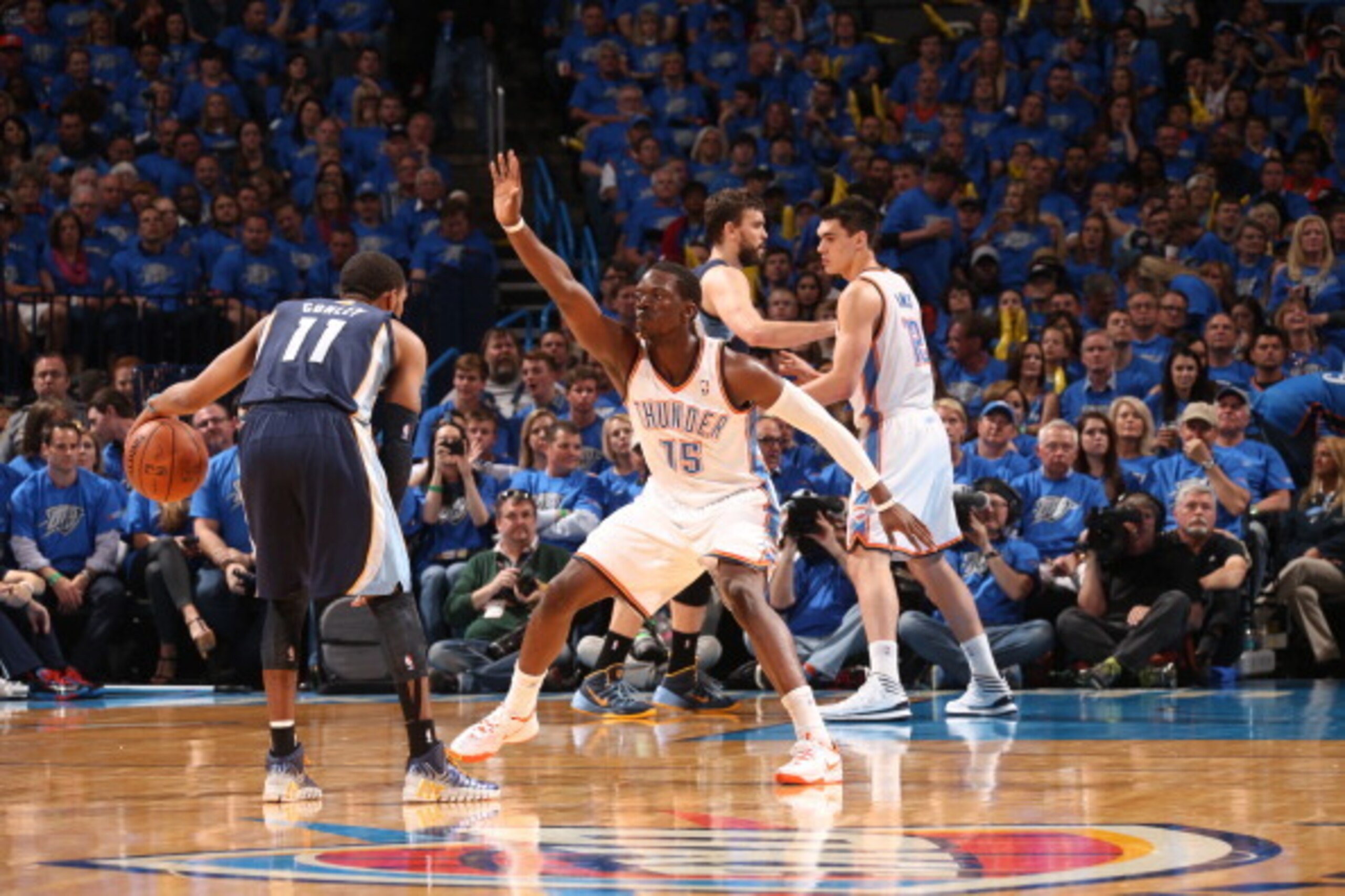OKLAHOMA CITY, OK - APRIL 19: Reggie Jackson #15 of the Oklahoma City Thunder defends against the Memphis Grizzlies during Game One of the Western Conference Quarterfinals of the NBA Playoffs at Chesapeake Energy Arena on April 19, 2014 in Oklahoma City, 