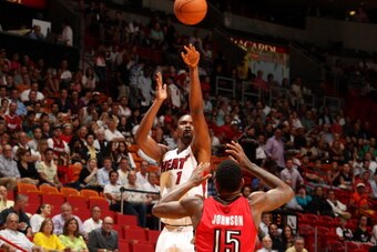 MIAMI, FL - March 31: Chris Bosh #1 of the Miami Heat shoots the ball against the Toronto Raptors at the American Airlines Arena in Miami, Florida on March 31 2014. NOTE TO USER: User expressly acknowledges and agrees that, by downloading and/or using thi