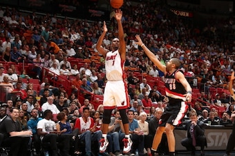 MIAMI, FL - MAY 24: Chris Bosh #1 of the Miami Heat shoots against Nicolas Batum #88 of the Portland Trail Blazers during a game on May 24, 2013 at American Airlines Arena in Miami, Florida.  NOTE TO USER: User expressly acknowledges and agrees that, by d