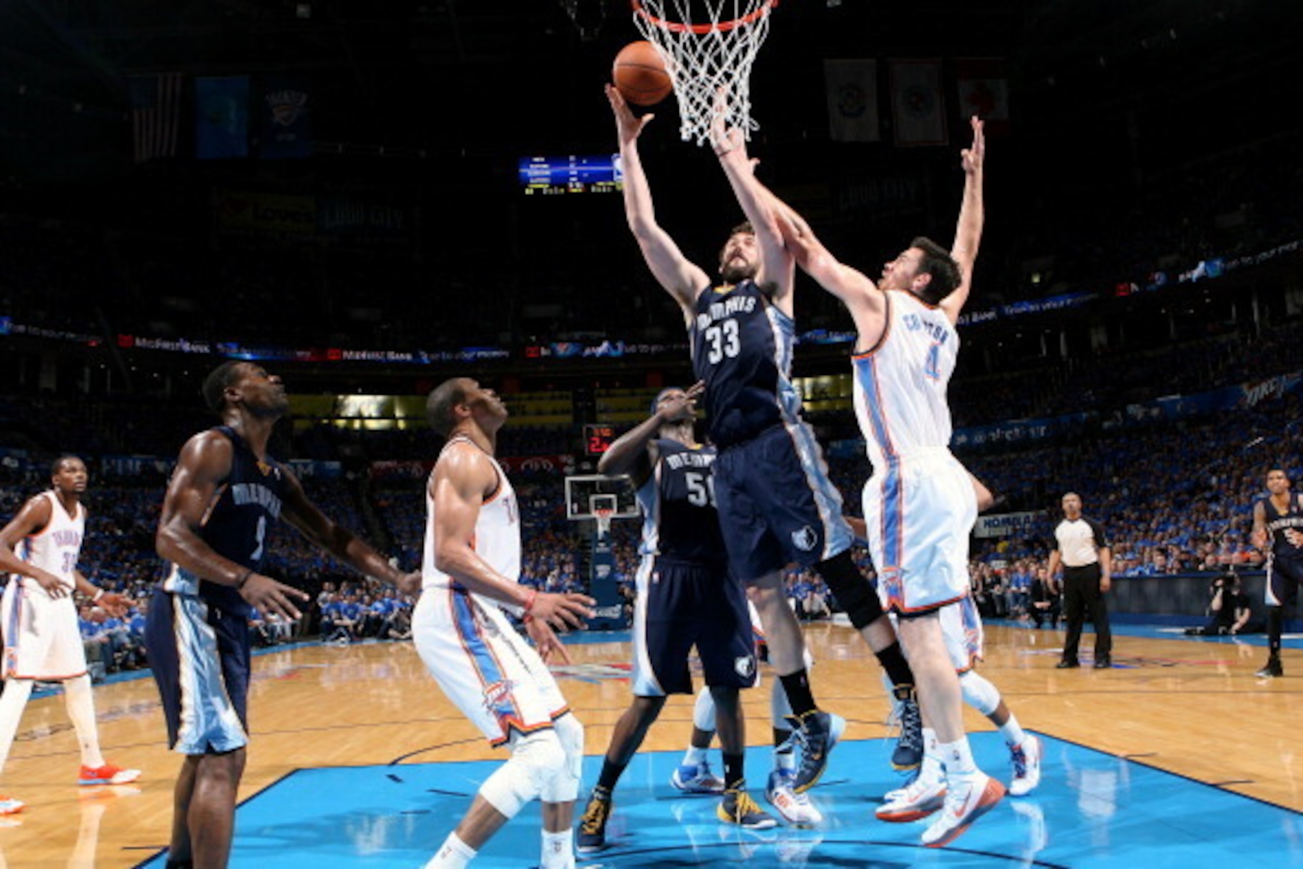 OKLAHOMA CITY, OK - APRIL 19: Marc Gasol #33 of the Memphis Grizzlies shoots against the Oklahoma City Thunder in Game One of the Western Conference Quarterfinals during the 2014 NBA Playoffs on April 19, 2014 at the Chesapeake Energy Arena in Oklahoma Ci