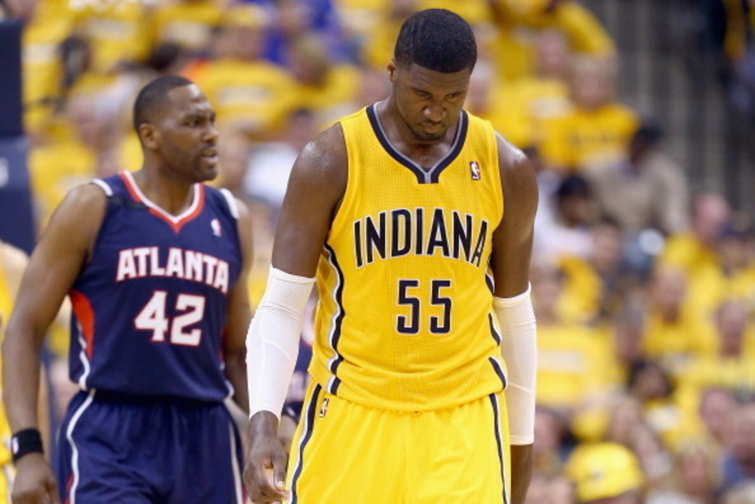 INDIANAPOLIS, IN - APRIL 19:  Roy Hibbert #55 of the the Indiana Pacers walks with his head down after a foul in the 101 -93 loss to the Atlanta Hawks in Game 1 of the Eastern Conference Quarterfinals during the 2014 NBA Playoffs at Bankers Life Fieldhous
