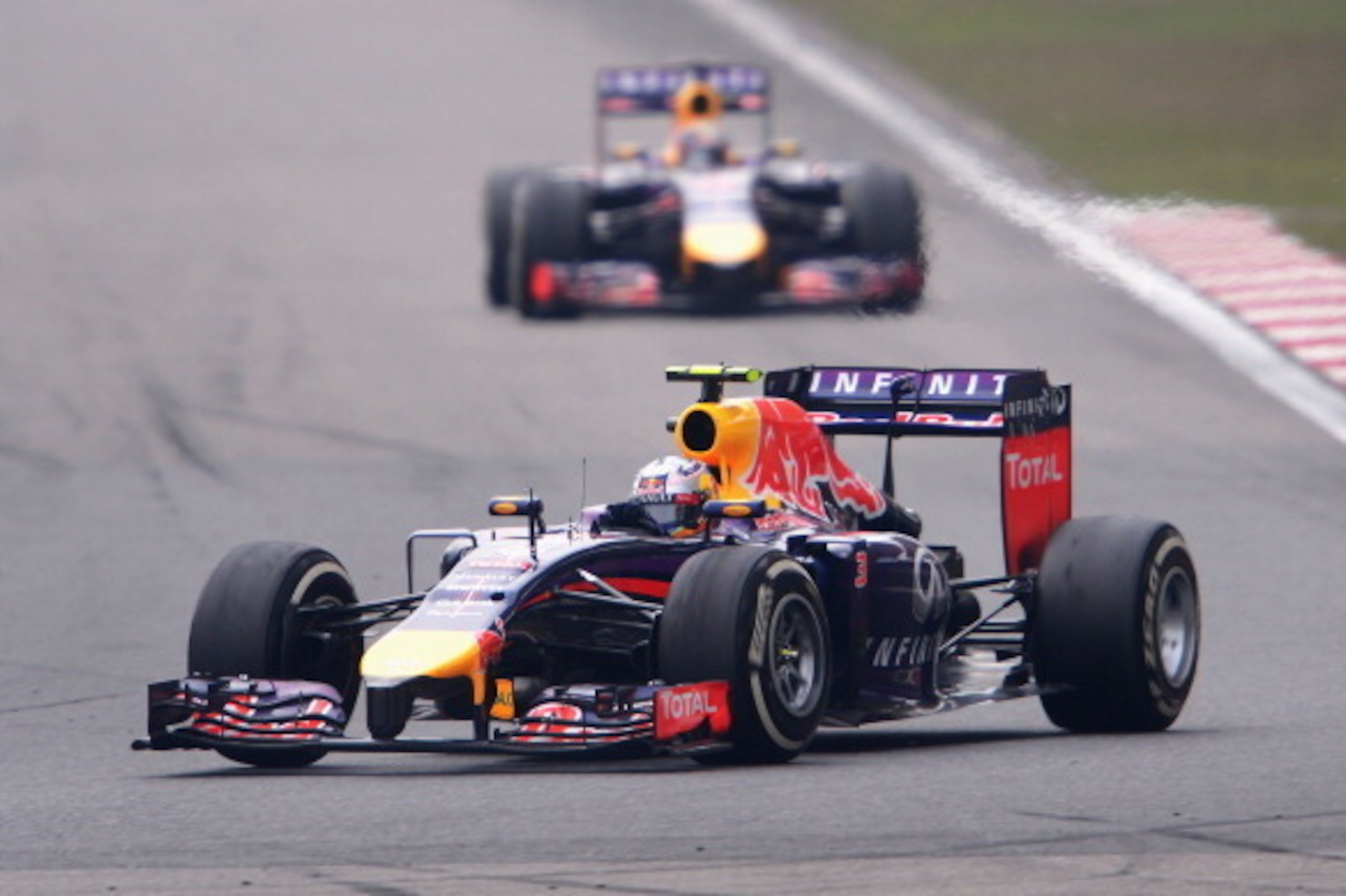 SHANGHAI, CHINA - APRIL 20:  Daniel Ricciardo of Australia and Infiniti Red Bull Racing drives during the Chinese Formula One Grand Prix at the Shanghai International Circuit on April 20, 2014 in Shanghai, China.  (Photo by Lars Baron/Getty Images)