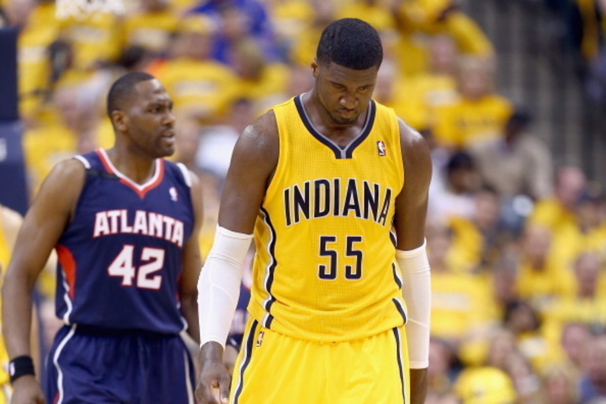 INDIANAPOLIS, IN - APRIL 19:  Roy Hibbert #55 of the the Indiana Pacers walks with his head down after a foul in the 101 -93 loss to the Atlanta Hawks in Game 1 of the Eastern Conference Quarterfinals during the 2014 NBA Playoffs at Bankers Life Fieldhous