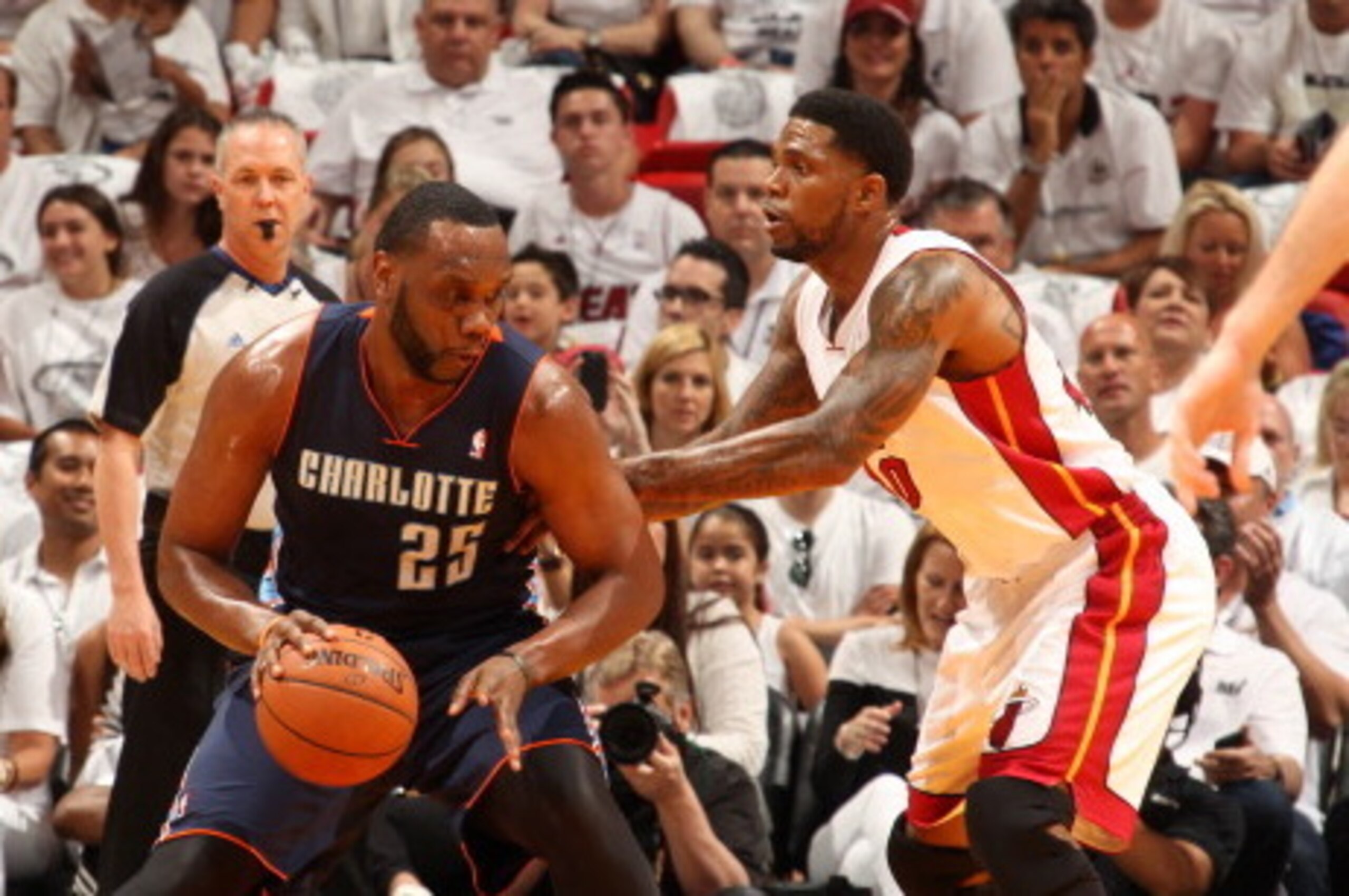 MIAMI, FL - April 20: Al Jefferson #25 of the Charlotte Bobcats handles the ball against the Miami Heat during Game One of the Eastern Conference Quarterfinals of the 2014 NBA playoffs at the American Airlines Arena in Miami, Florida on April 20, 2014. NO