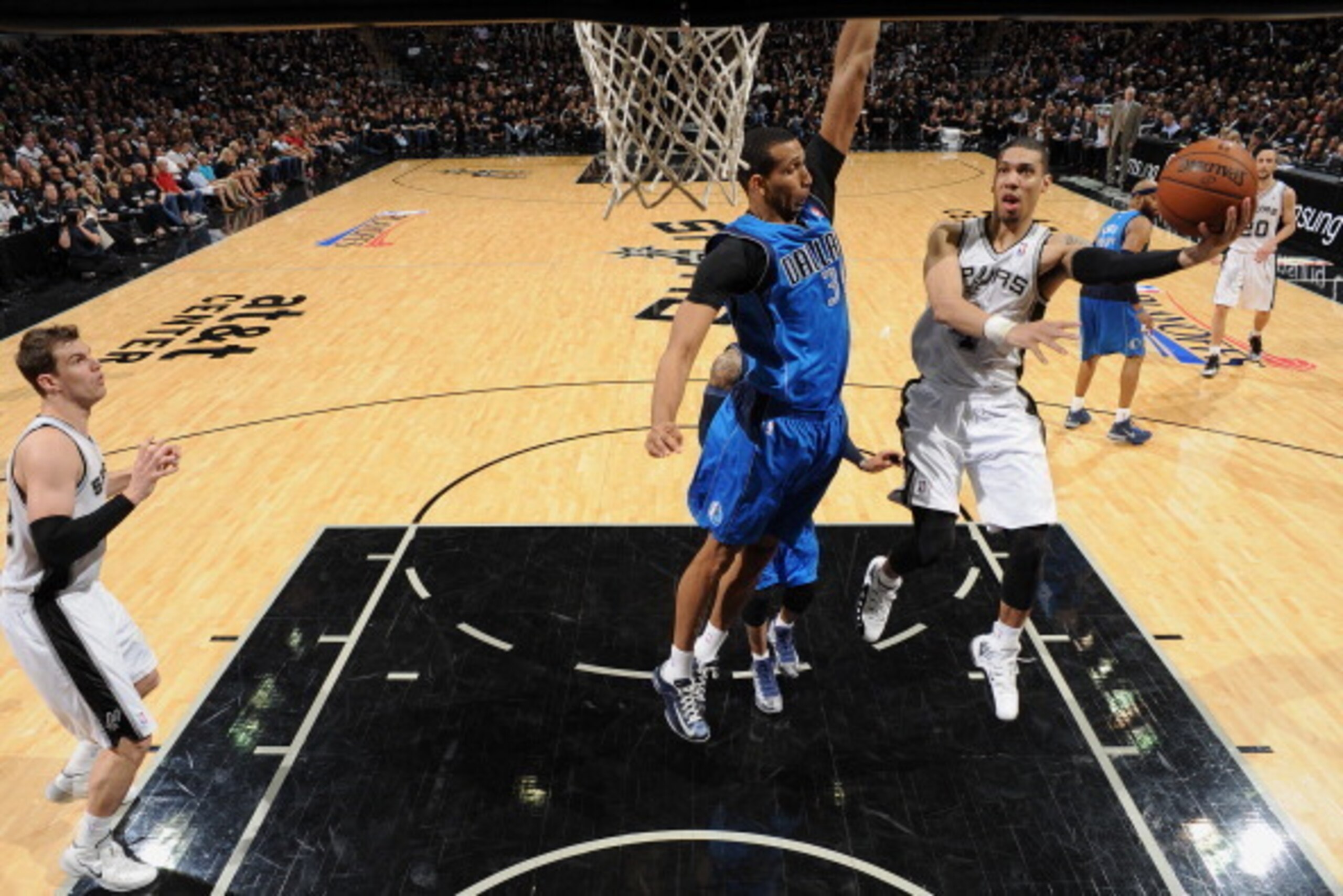SAN ANTONIO, TX - APRIL 20: Danny Green #4 of the San Antonio Spurs shoots against the Dallas Mavericks in Game One of the Western Conference Quarterfinals during the 2014 NBA Playoffs on April 20, 2014 at the AT&T Center in San Antonio, Texas. NOTE TO US