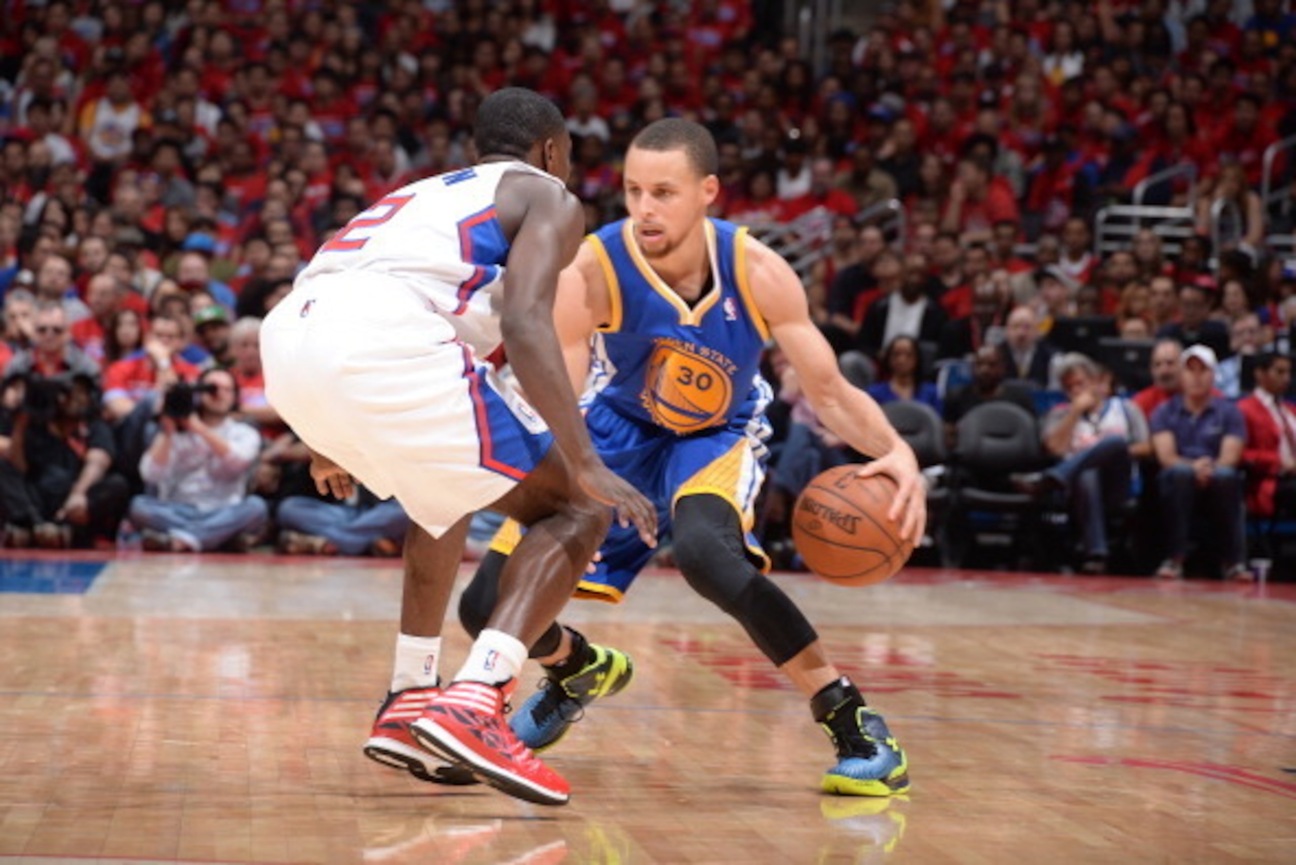 LOS ANGELES, CA - APRIL 19: Stephen Curry #30 of the Golden State Warriors drives to the basket during Game One of the Western Conference Quarterfinals of the NBA Playoffs against the Golden State Warriors at STAPLES Center on April 19, 2014 in Los Angele