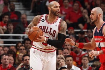 CHICAGO, IL - APRIL 20: Carlos Boozer #5 of the Chicago Bulls handles the ball against the Washington Wizards during Game 1 of the Eastern Conference Quarterfinals on April 20, 2014 at the United Center in Chicago, Illinois. NOTE TO USER: User expressly a CHICAGO, IL - APRIL 20: Carlos Boozer #5 of the Chicago Bulls handles the ball against the Washington Wizards during Game 1 of the Eastern Conference Quarterfinals on April 20, 2014 at the United Center in Chicago, Illinois. NOTE TO USER: User expressly a