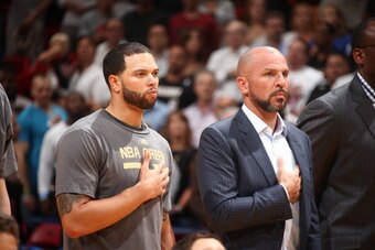 MIAMI, FL - APRIL 8: Deron Williams #8 and Jason Kidd of the Brooklyn Nets look on against the Miami Heat during game on April 8, 2014 at American Airlines Arena in Miami, Florida.  NOTE TO USER: User expressly acknowledges and agrees that, by downloading