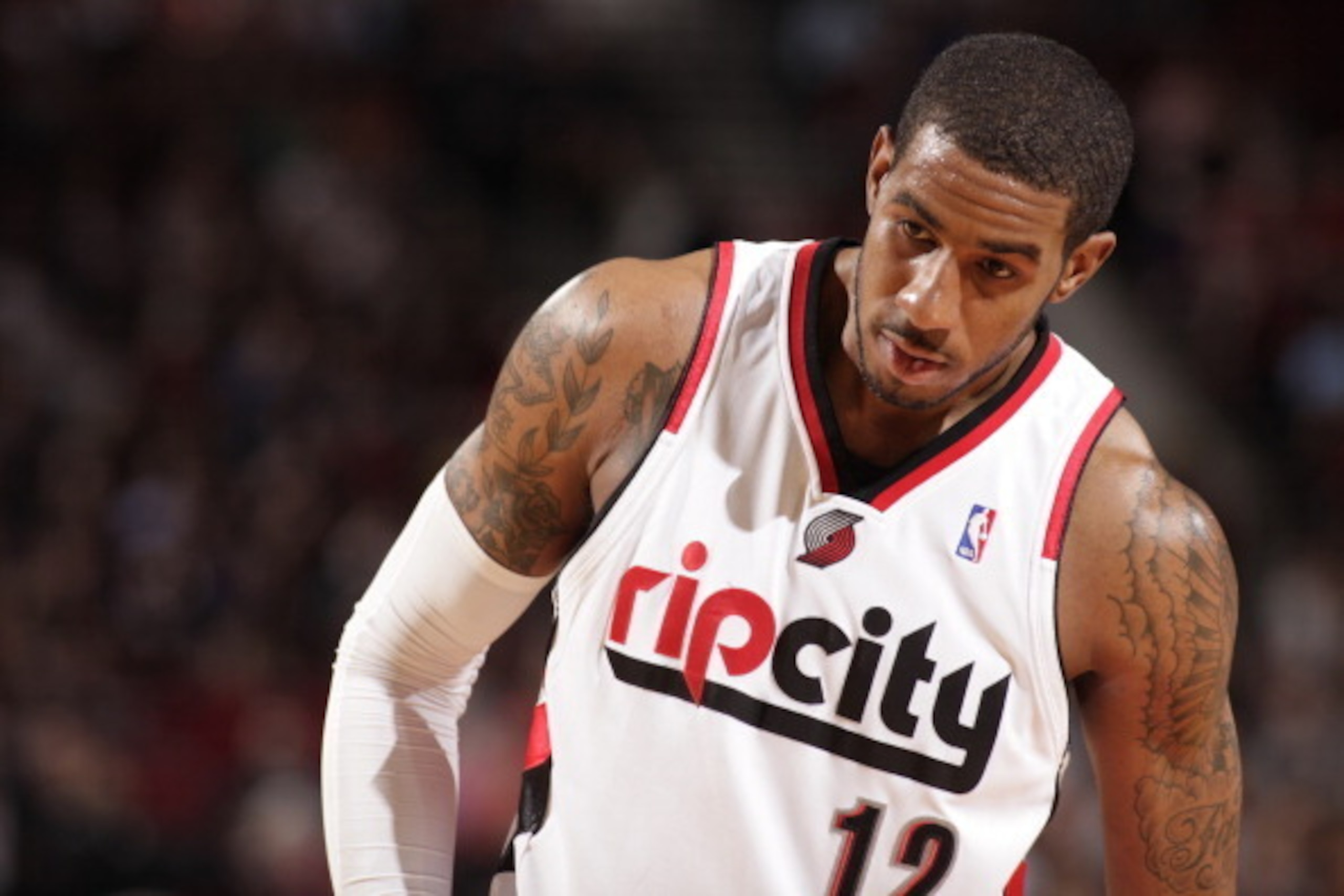 PORTLAND, OR - APRIL 13: LaMarcus Aldridge #12 of the Portland Trail Blazers stands on the court during a game against the Golden State Warriors on April 13, 2014 at the Moda Center Arena in Portland, Oregon. NOTE TO USER: User expressly acknowledges and 