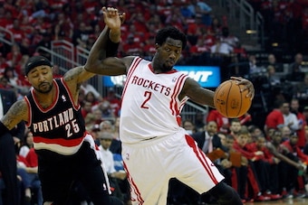 HOUSTON, TX - APRIL 20:  Patrick Beverley #2 of the Houston Rockets is fouled by Mo Williams #25 of the Portland Trail Blazers in Game One of the Western Conference Quarterfinals during the 2014 NBA Playoffs at the Toyota Center on April 20, 2014 in Houst