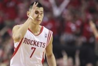 Apr 20, 2014; Houston, TX, USA; Houston Rockets guard Jeremy Lin (7) celebrates after scoring during the first quarter against the Portland Trail Blazers in game one during the first round of the 2014 NBA Playoffs at Toyota Center. Mandatory Credit: Troy 