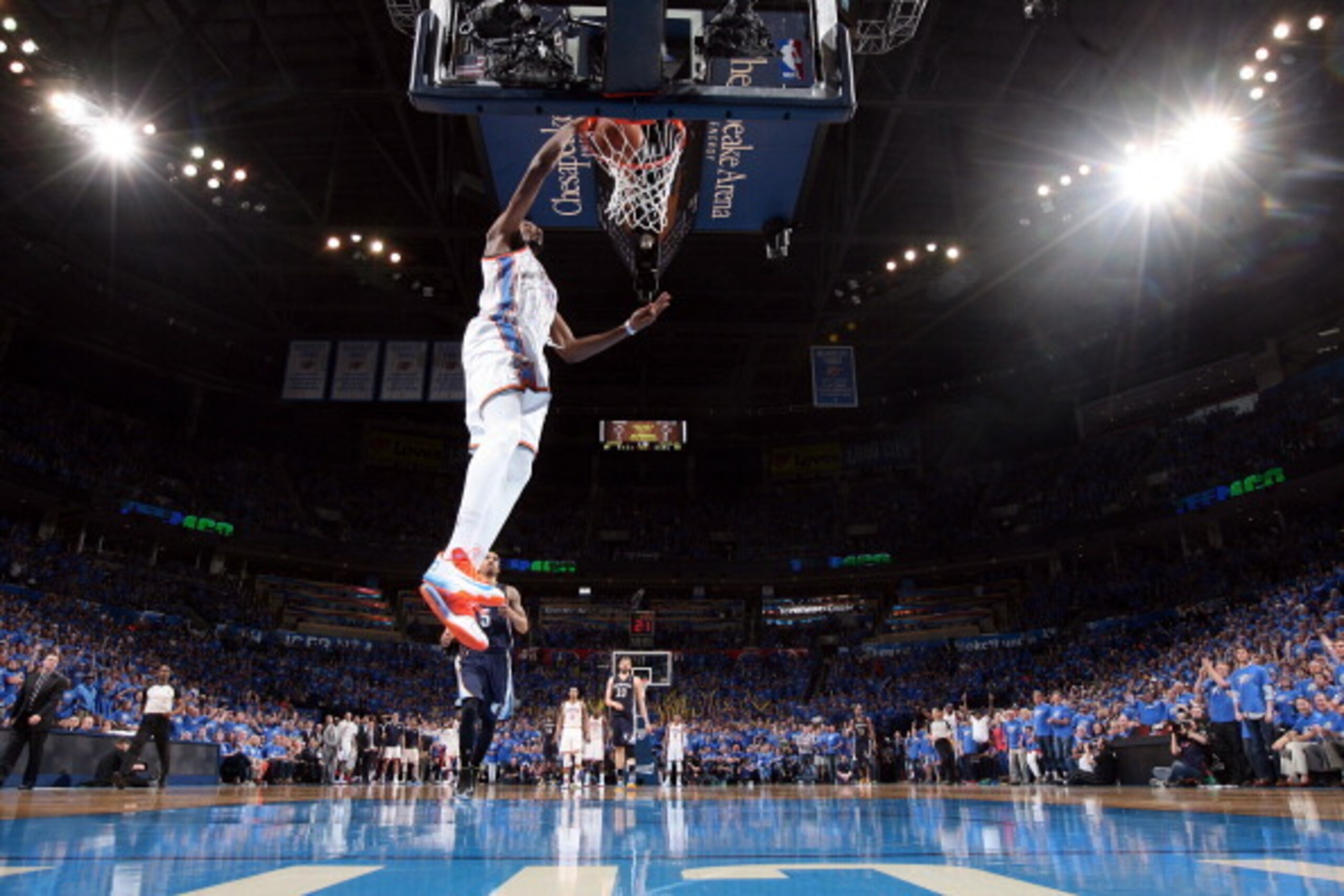OKLAHOMA CITY, OK - APRIL 19: Kevin Durant #35 of the Oklahoma City Thunder dunks against the Memphis Grizzlies during Game One of the Western Conference Quarterfinals of the NBA Playoffs at Chesapeake Energy Arena on April 19, 2014 in Oklahoma City, Okla