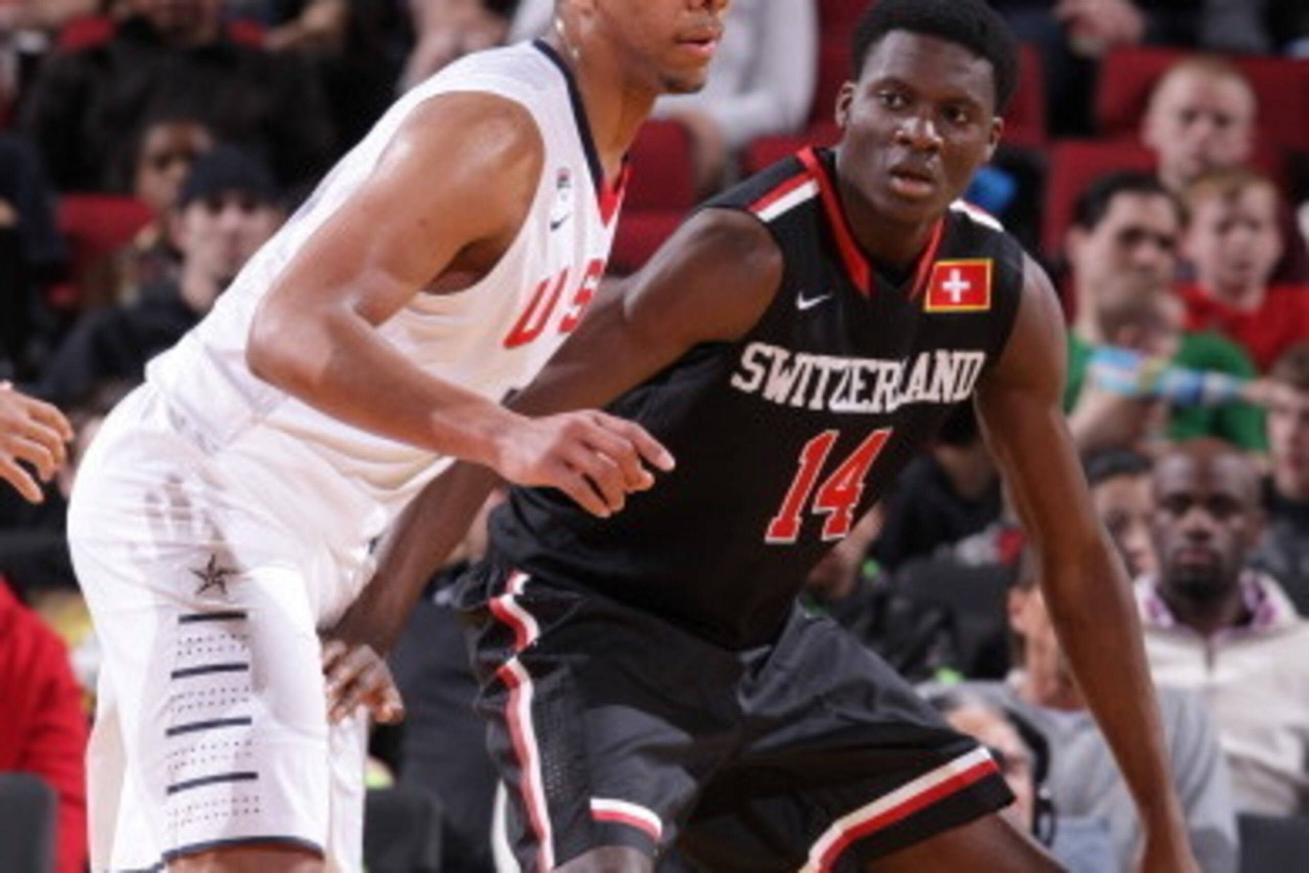PORTLAND, OR - APRIL 12:  Clint Capela #14 of the World Team boxes out against Team USA on April 12, 2014 at the Moda Center Arena in Portland, Oregon. NOTE TO USER: User expressly acknowledges and agrees that, by downloading and or using this photograph,