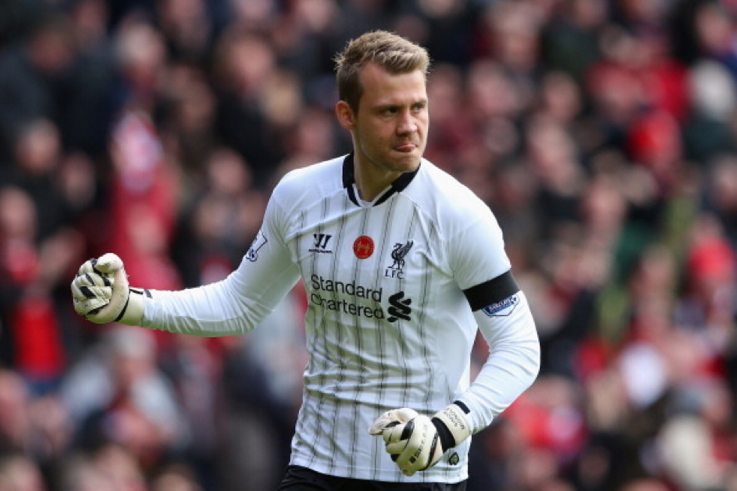 LIVERPOOL, ENGLAND - APRIL 13:   Simon Mignolet of Liverpool celebrates the second goal during the Barclays Premier League match between Liverpool and Manchester City at Anfield on April 13, 2014 in Liverpool, England.  (Photo by Alex Livesey/Getty Images