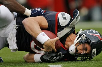 David Carr takes a nasty spill as he's being sacked as the QB of the Texans.