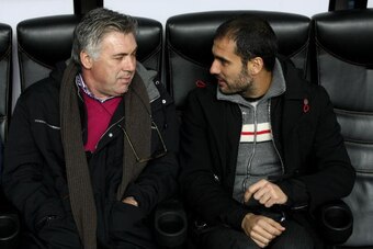MILAN, ITALY - DECEMBER 22:  AC Milan's coach Carlo Ancelotti (L) and FC Barcelona coach Pep Guardiola (R) attend 'A Goal For Peace', a charity friendly match between Iraq versus the rest of the world at San Siro Stadium on December 22, 2008 in Milan, Ita