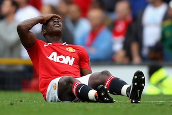 MANCHESTER, ENGLAND - AUGUST 28:  Danny Welbeck of Manchester United lies injured on the pitch during the Barclays Premier League match between Manchester United and Arsenal at Old Trafford on August 28, 2011 in Manchester, England.  (Photo by Alex Livese