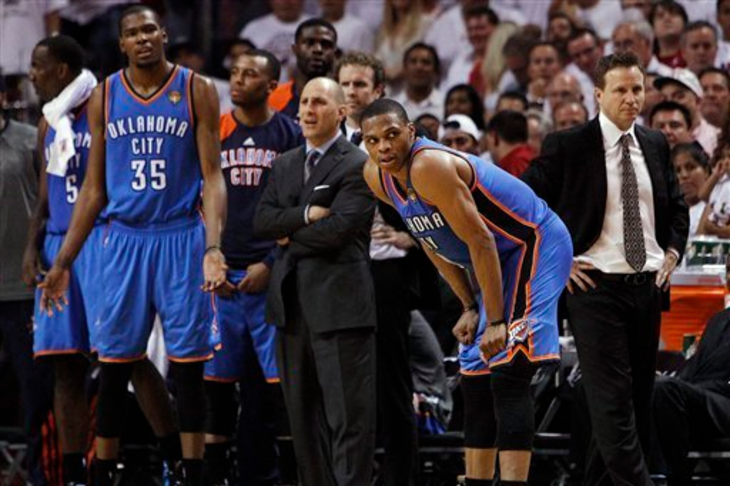 Durant and Westbrook watch Game 5 of the 2012 NBA Finals slip away as the Miami Heat clinch the title.