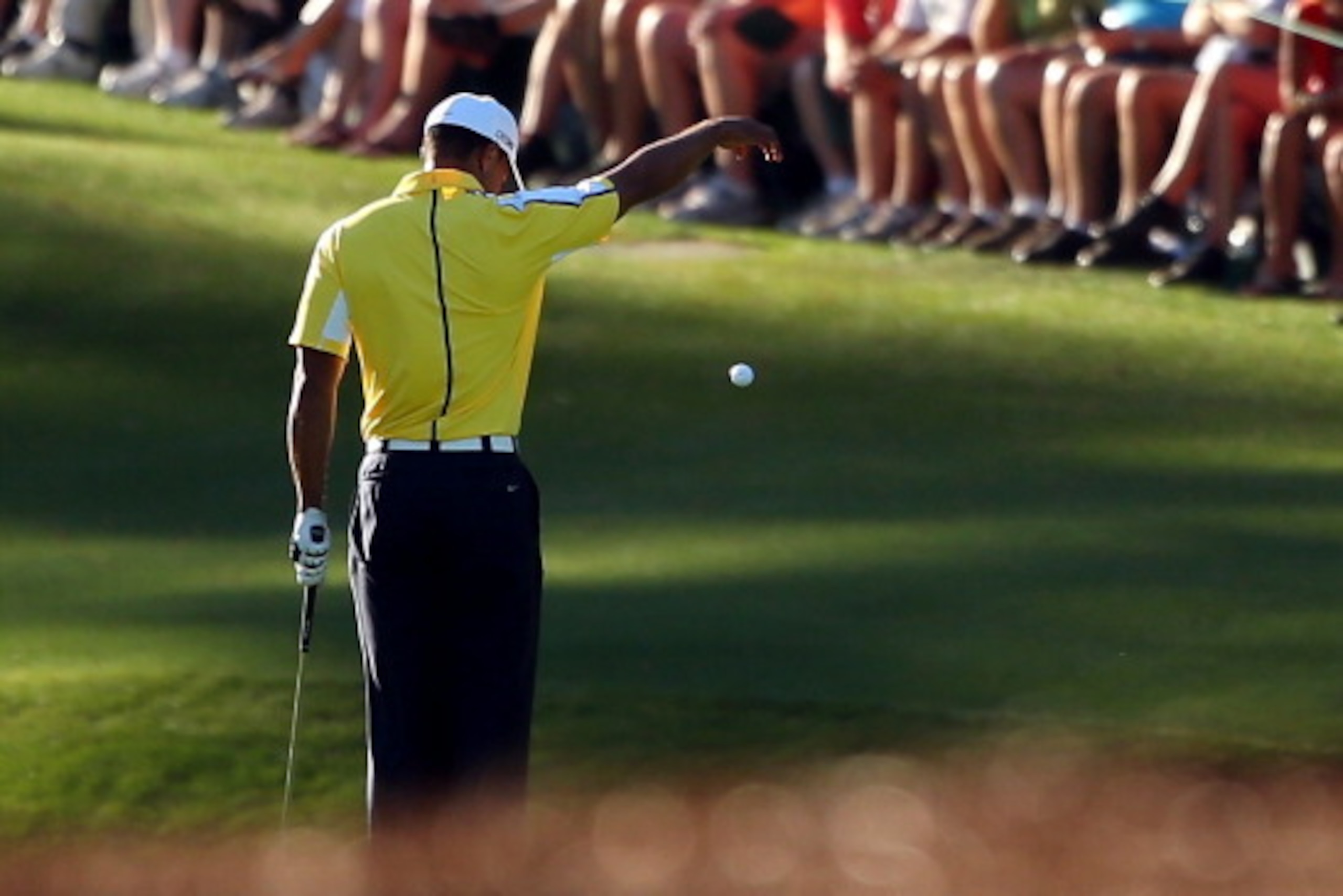 AUGUSTA, GA - APRIL 12:  Tiger Woods of the United States drops his ball after he hits it into the water on the 15th hole during the second round of the 2013 Masters Tournament at Augusta National Golf Club on April 12, 2013 in Augusta, Georgia.  (Photo b