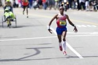 Apr 21, 2014; Boston, MA, USA; Meb Keflezighi during the 2014 Boston Marathon. Mandatory Credit: David Butler II-USA TODAY Sports