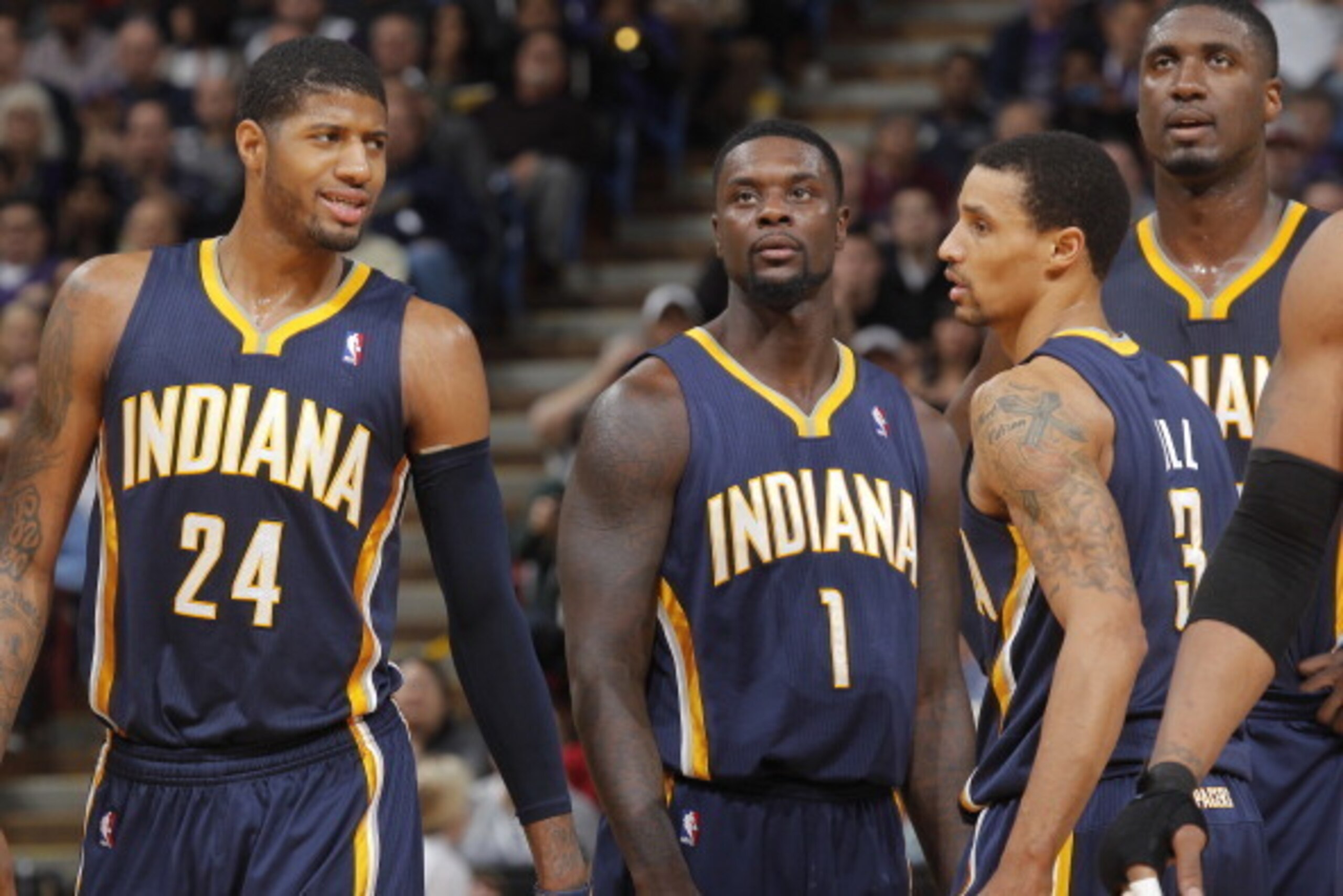 SACRAMENTO, CA - JANUARY 24: Paul George #24, Lance Stephenson #1, George Hill #3 and Roy Hibbert #55 of the Indiana Pacers face off against the Sacramento Kings on January 24, 2014 at Sleep Train Arena in Sacramento, California. NOTE TO USER: User expres