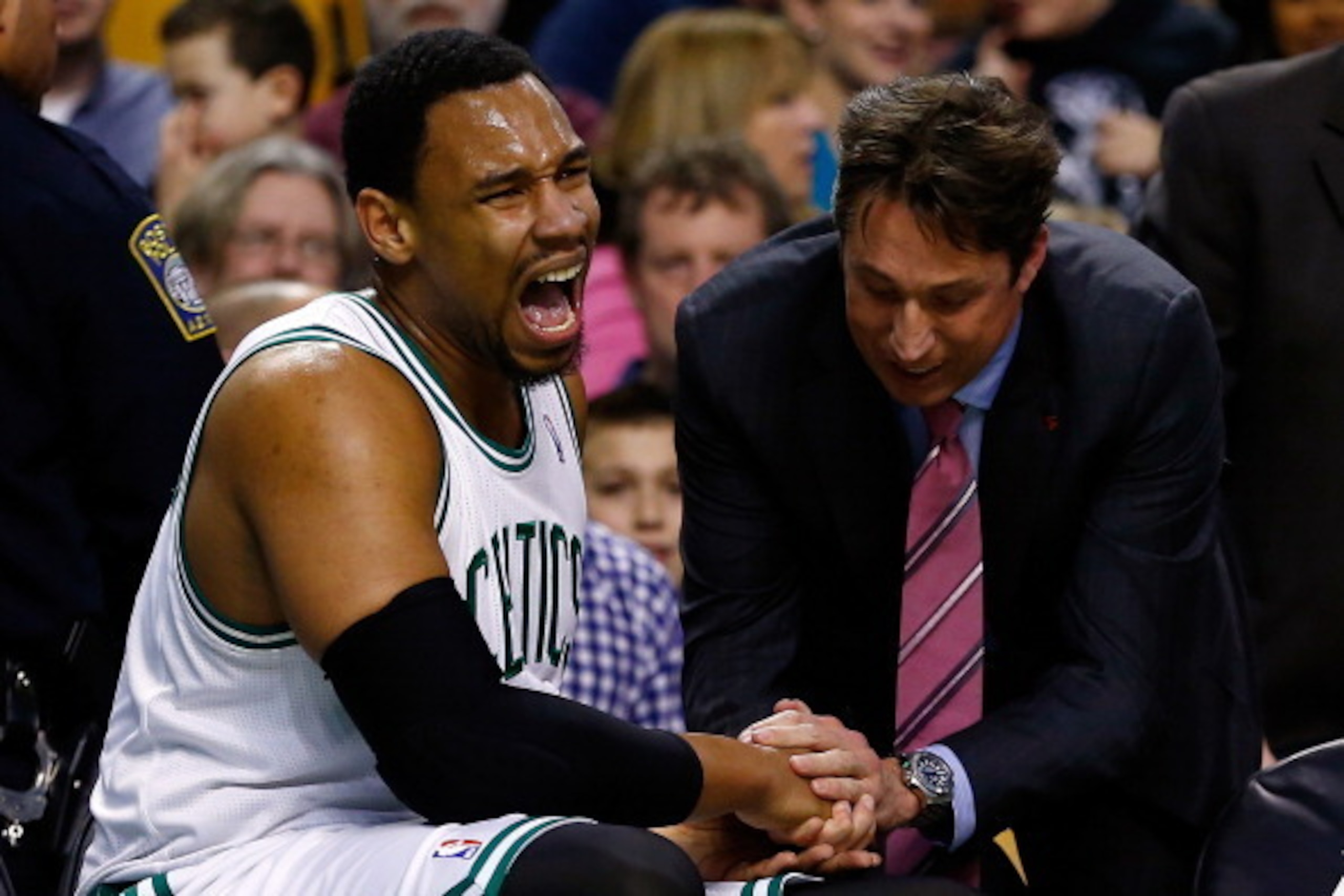 BOSTON, MA - JANUARY 24:  Jared Sullinger #7 of the Boston Celtics is treated after injuring his hand during a game against the Oklahoma City Thunder at the TD Garden on January 24, 2014 in Boston, Massachusetts. NOTE TO USER: User expressly acknowledges 