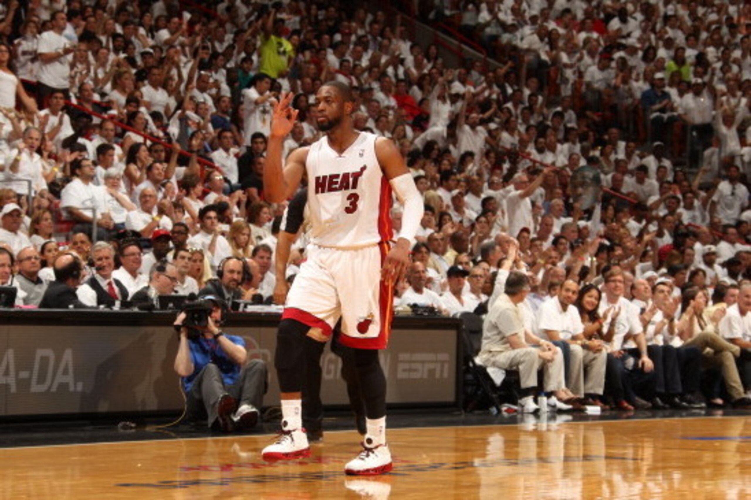MIAMI, FL - April 20:  Dwyane Wade #3 of the Miami Heat celebrates against the Charlotte Bobcats during Game One of the Eastern Conference Quarterfinals of the 2014 NBA playoffs at the American Airlines Arena in Miami, Florida on April 20, 2014. NOTE TO U