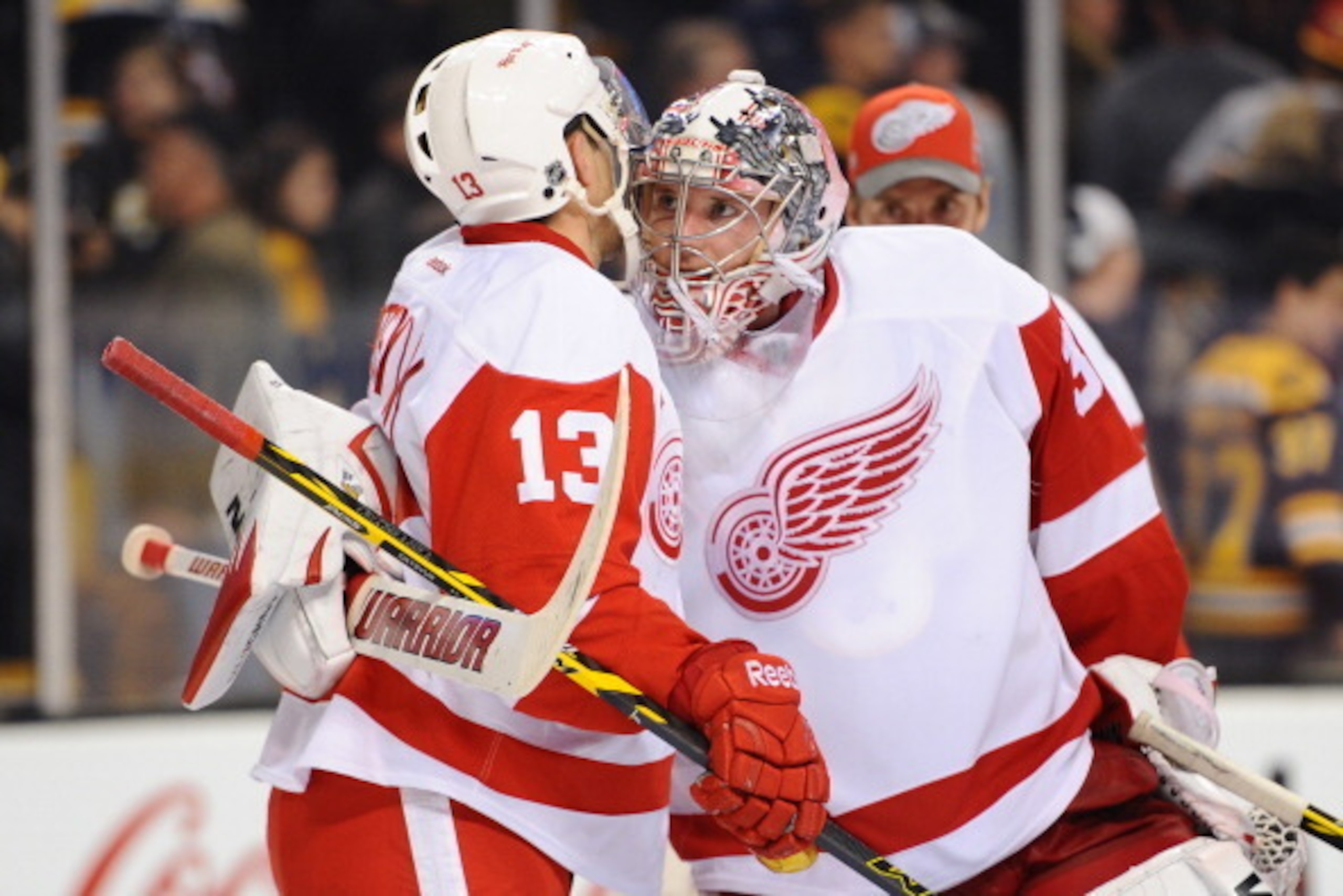BOSTON, MA - APRIL 18: Jimmy Howard #35 and Pavel Datsyuk #13 of the Detroit Red Wings celebrate a shutout win against the Boston Bruins in Game One of the First Round of the 2014 Stanley Cup Playoffs at TD Garden on April 18, 2014 in Boston, Massachusett
