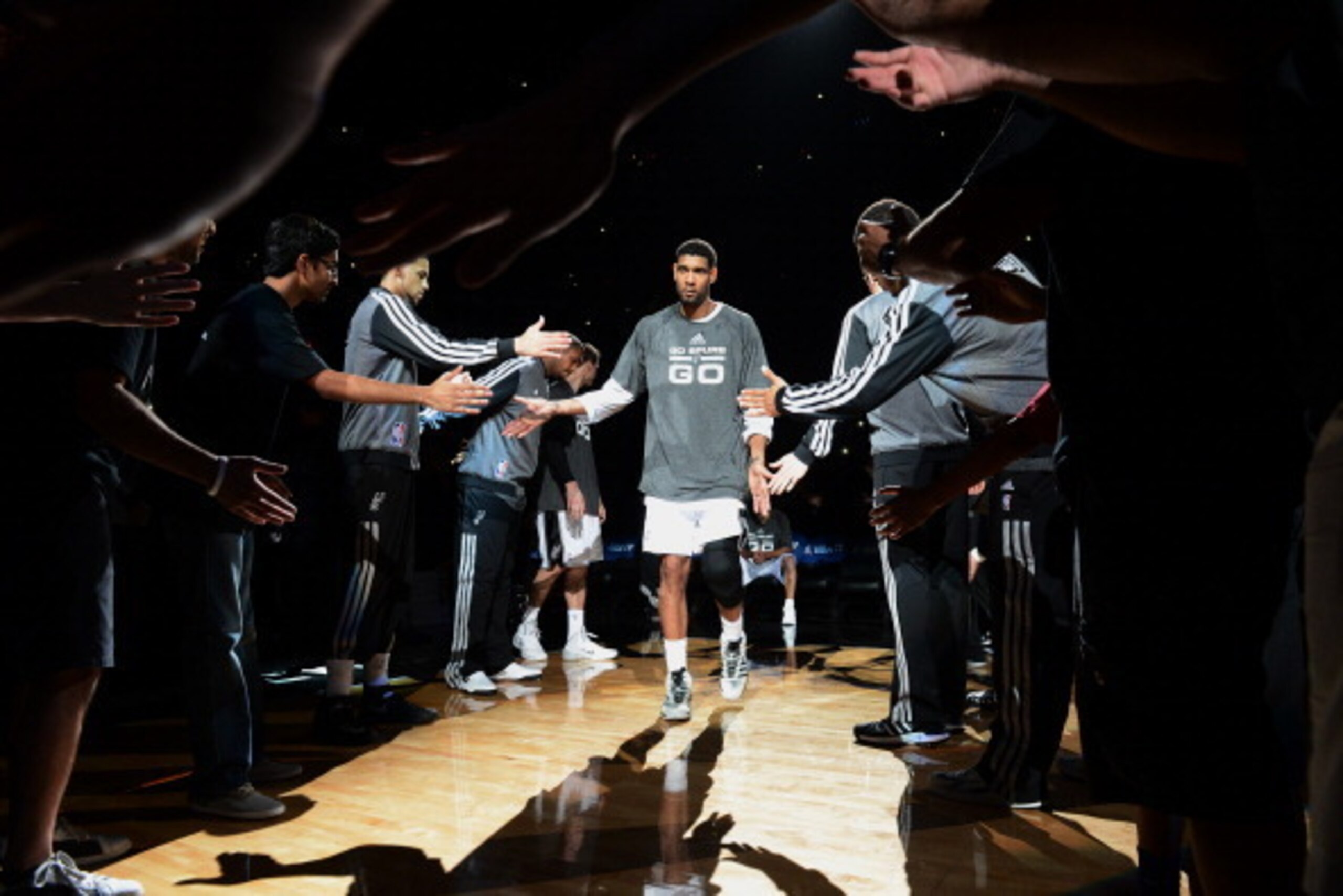 SAN ANTONIO, TX - APRIL 20: Tim Duncan #21 of the San Antonio Spurs gets introduced before a game against the Dallas Mavericks in Game One of the Western Conference Quarterfinals during the 2014 NBA Playoffs on April 20, 2014 at the AT&T Center in San Ant
