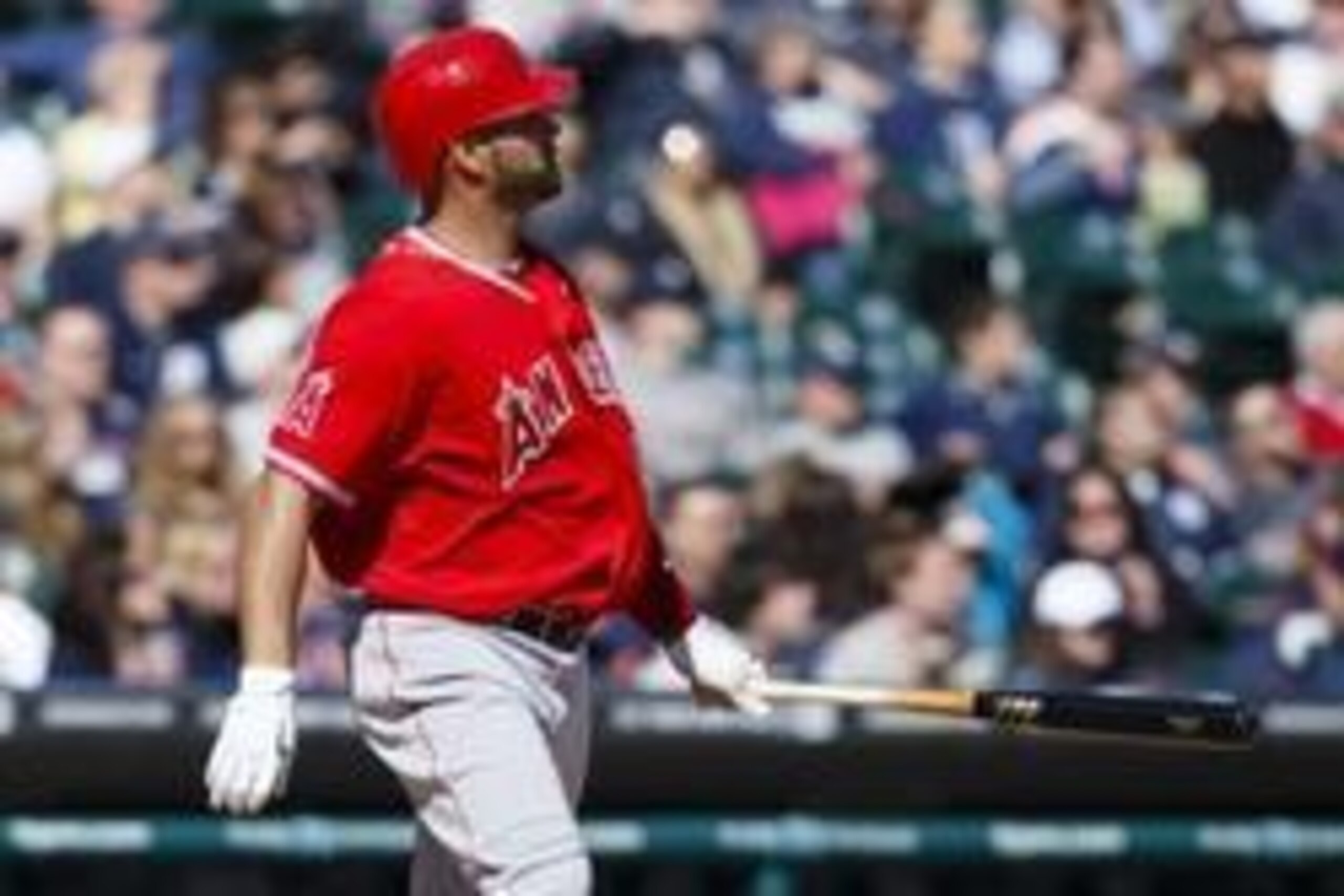 Apr 19, 2014; Detroit, MI, USA; Los Angeles Angels designated hitter Albert Pujols (5) watches as the ball he hit goes over the left field wall for a home run in the ninth inning against the Detroit Tigers at Comerica Park. Detroit won 5-2. Mandatory Cred