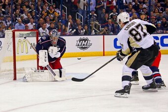 COLUMBUS, OH - APRIL 21:  Sergei Bobrovsky #72 of the Columbus Blue Jackets stops a shot from Sidney Crosby #87 of the Pittsburgh Penguins during the first period in Game Three of the First Round of the 2014 NHL Stanley Cup Playoffs at Nationwide Arena on