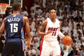 MIAMI, FL - April 20: Mario Chalmers #15 of the Miami Heat drives against the Charlotte Bobcats during Game One of the Eastern Conference Quarterfinals of the 2014 NBA playoffs at the American Airlines Arena in Miami, Florida on April 20, 2014. NOTE TO US