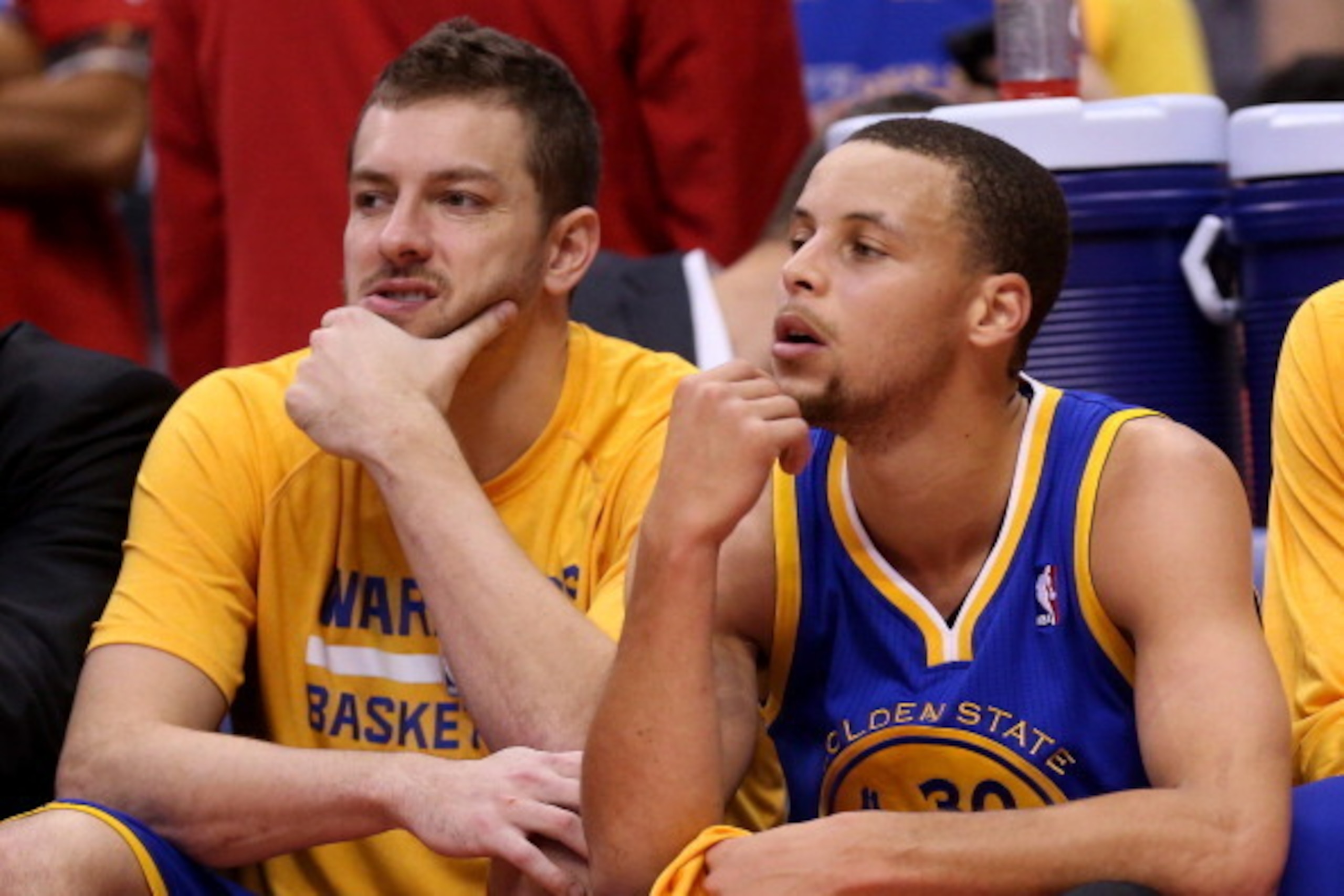 LOS ANGELES, CA - APRIL 21:  Stephen Curry #30(R) and David Lee #10 of the Golden State Warriors sit out the fourth quarter against the Los Angeles Clippers in Game Two of the Western Conference Quarterfinals during the 2014 NBA Playoffs at Staples Center
