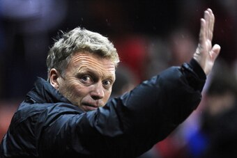STOKE ON TRENT, ENGLAND - DECEMBER 18:  Manchester United manager David Moyes waves prior to the Capital One Cup Quarter Final match between Stoke City and Manchester United at the Britannia Stadium on December 18, 2013 in Stoke on Trent, England.  (Photo