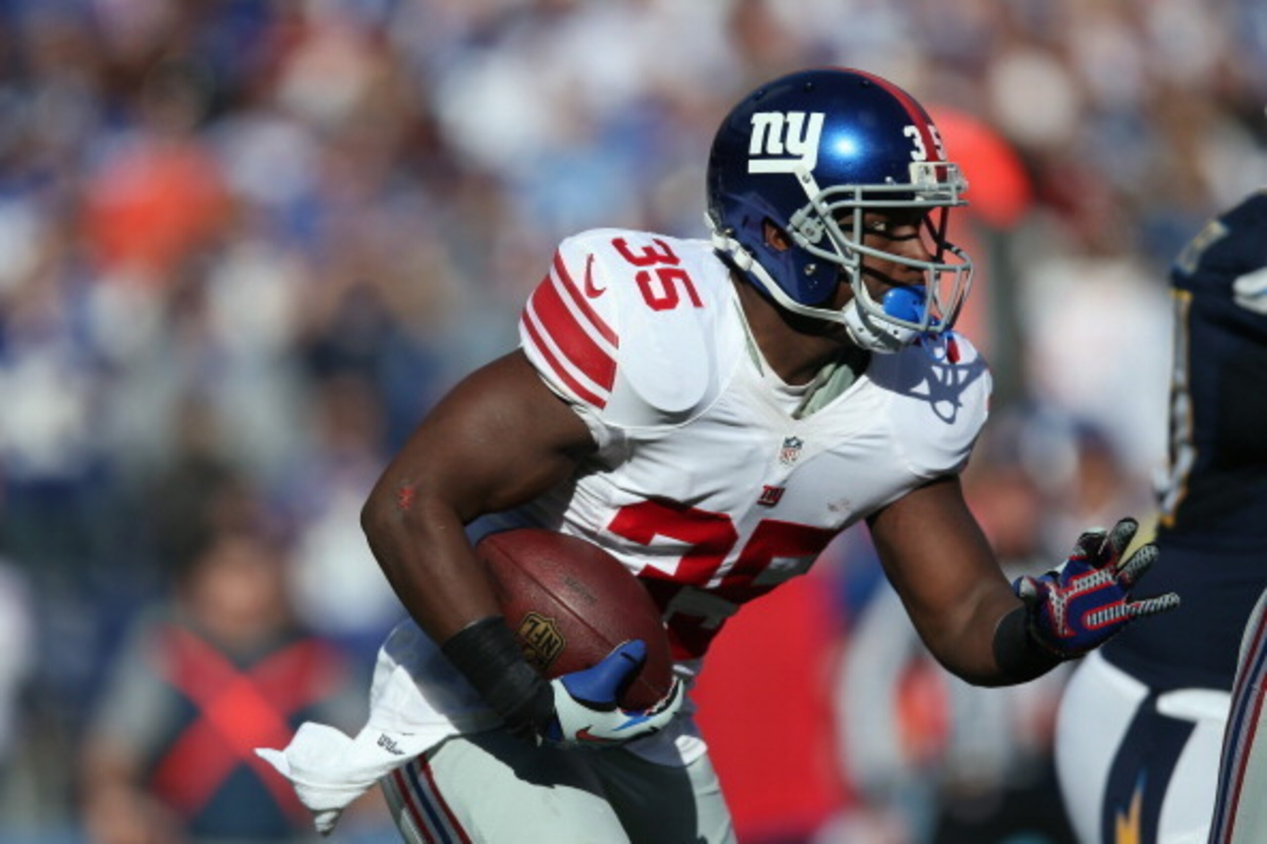 SAN DIEGO, CA - DECEMBER 08:  Running back Andre Brown #35 of the New York Giants carries the ball against the San Diego Chargers at Qualcomm Stadium on December 8, 2013 in San Diego, California.  (Photo by Jeff Gross/Getty Images)