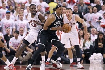 TORONTO, ON - APRIL 19:  Paul Pierce #34 of the Brooklyn Nets controls the ball in the late stages against the Toronto Raptors in Game One of the NBA Eastern Conference play-off at the Air Canada Centre on April 19, 2014 in Toronto, Ontario, Canada. The N