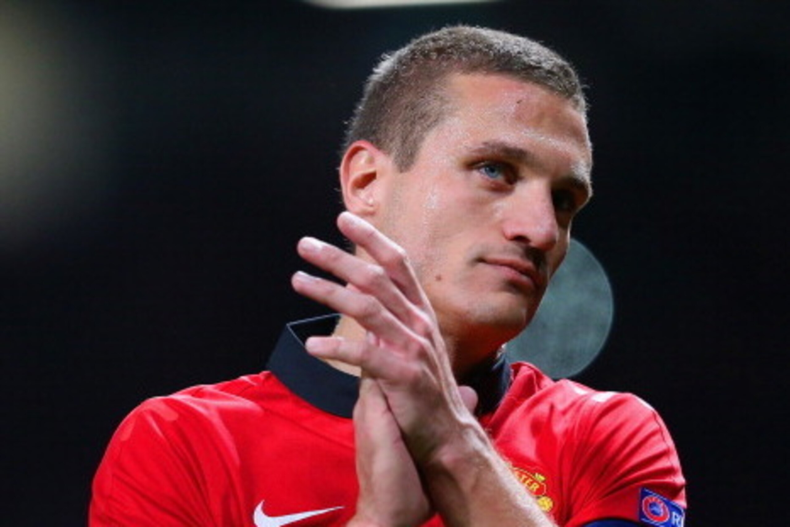 MANCHESTER, ENGLAND - APRIL 01: Nemanja Vidic of Manchester United applauds the fans at the final whistle during the UEFA Champions League Quarter Final first leg match between Manchester United and FC Bayern Muenchen at Old Trafford on April 1, 2014 in M MANCHESTER, ENGLAND - APRIL 01: Nemanja Vidic of Manchester United applauds the fans at the final whistle during the UEFA Champions League Quarter Final first leg match between Manchester United and FC Bayern Muenchen at Old Trafford on April 1, 2014 in M