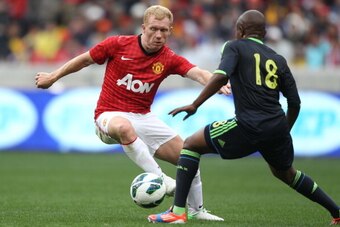CAPE TOWN, SOUTH AFRICA - JULY 21:  Paul Scholes of Manchester United FC in action during the MTN Football Invitational match between Ajax Cape Town and Manchester United at Cape Town Stadium on July 21, 2012 in Cape Town, South Africa.  (Photo by Luke Wa