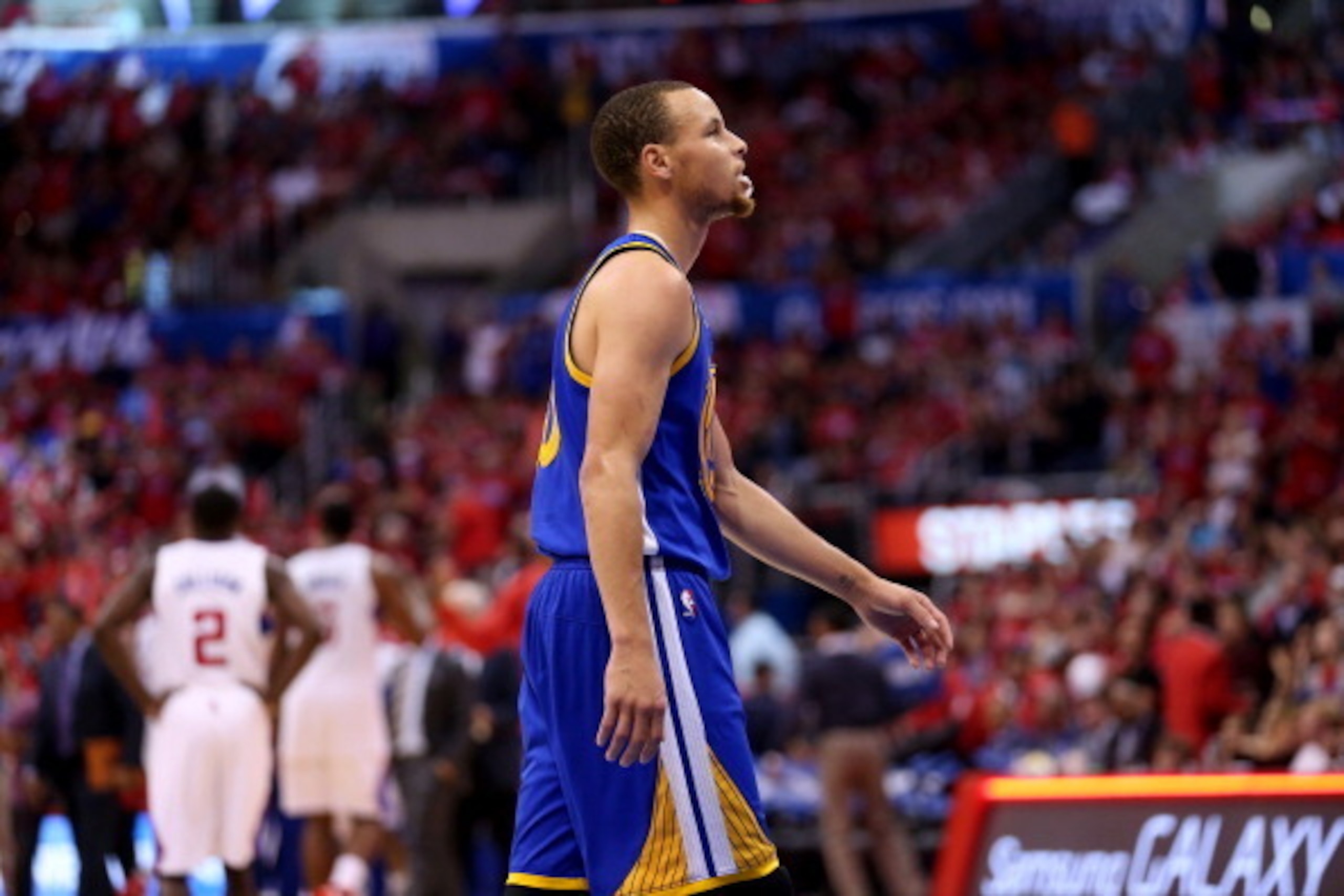 LOS ANGELES, CA - APRIL 21: Stephen Curry #30 of the Golden State Warriors walks to the bench at the end of the third quarter in the game against the Los Angeles Clippers in Game Two of the Western Conference Quarterfinals during the 2014 NBA Playoffs at LOS ANGELES, CA - APRIL 21: Stephen Curry #30 of the Golden State Warriors walks to the bench at the end of the third quarter in the game against the Los Angeles Clippers in Game Two of the Western Conference Quarterfinals during the 2014 NBA Playoffs at