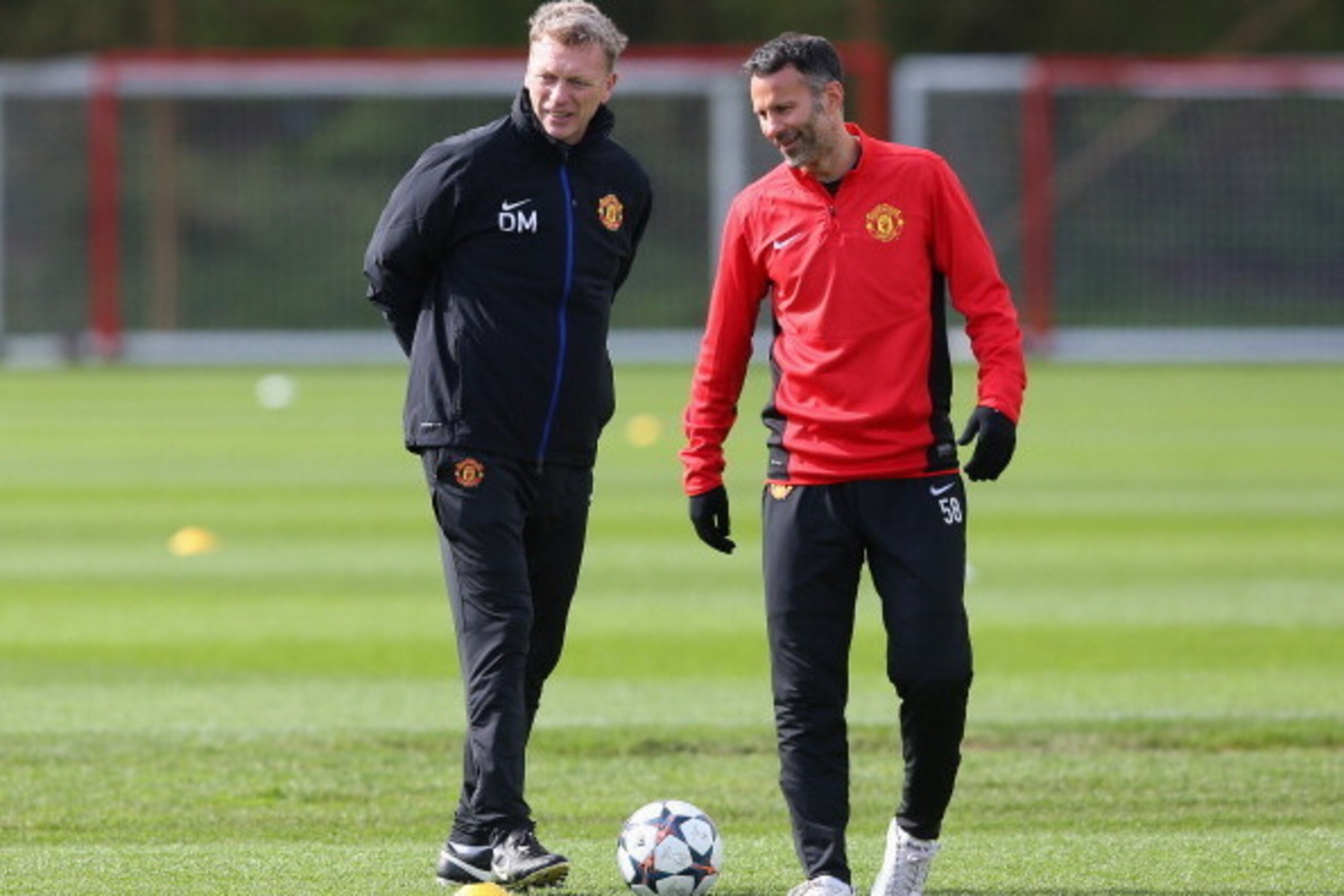 MANCHESTER, ENGLAND - APRIL 08:  David Moyes the manager of Manchester United and Ryan Giggs look on during a training session at Aon Training Complex on April 8, 2014 in Manchester, England.  (Photo by Alex Livesey/Getty Images)